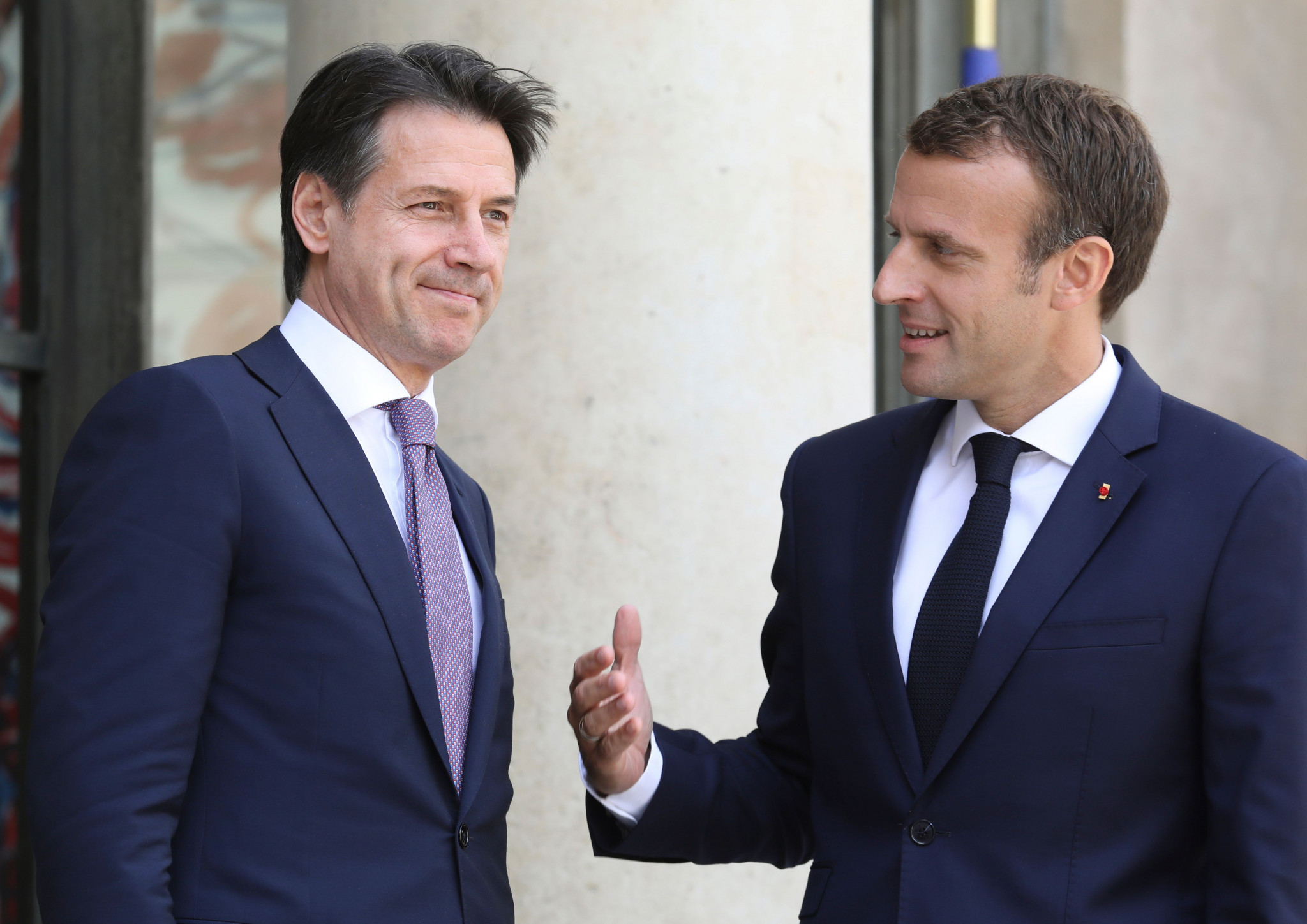 Giuseppe Conte, left, pictured with French President Emmanuel Macron today, has not yet publicly commented on the potential Winter Olympic bid ©Getty Images