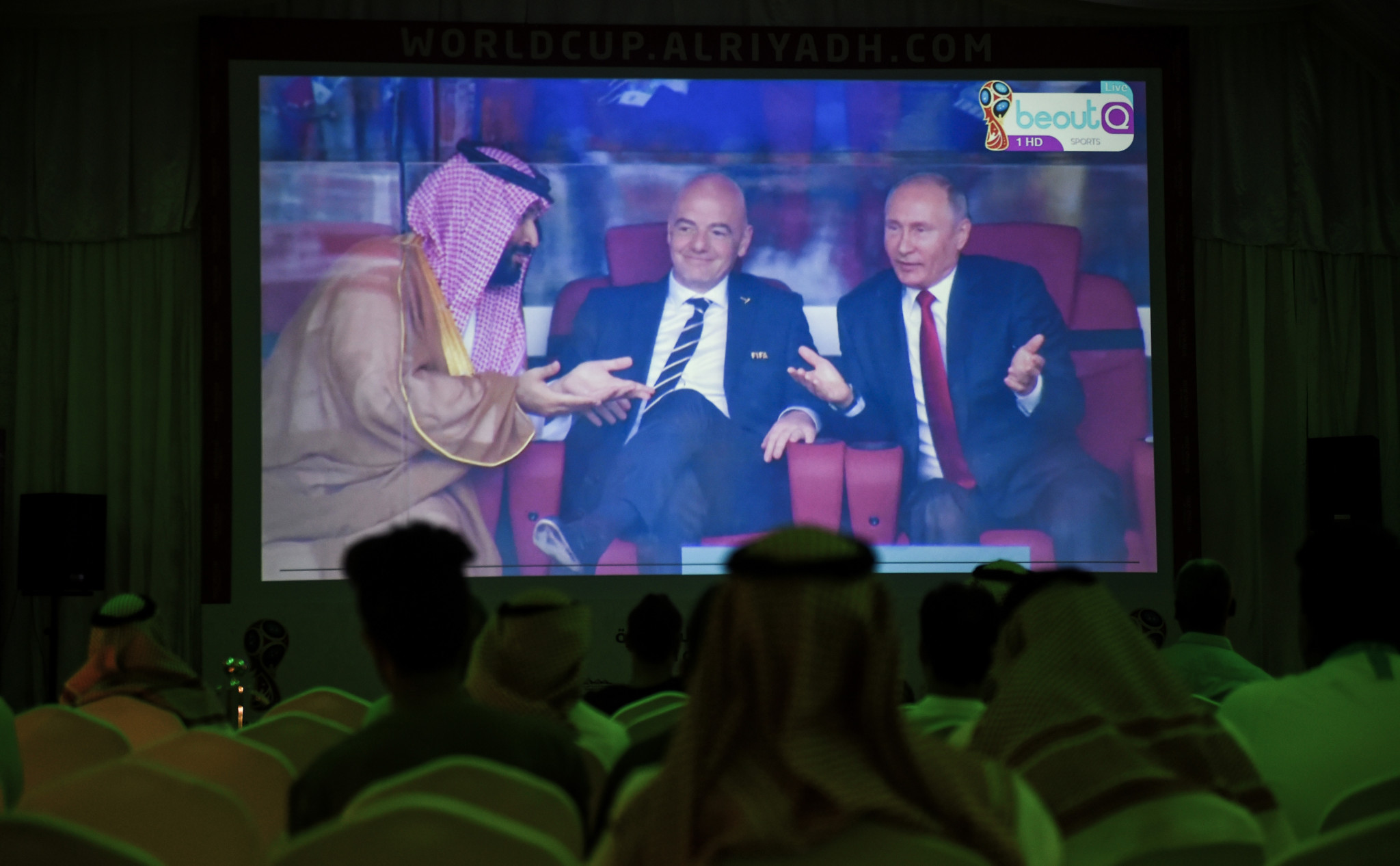 Fans in Riyadh watch their country's opening World Cup match against on Russia on the BeoutQ feed as Saudi Crown Prince Mohammed bin Salman, left, attends the game in Moscow ©Getty Images