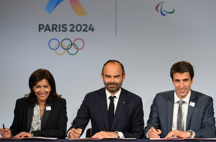 Anne Hidalgo - Paris Mayor and President of the SOLIDEO Games delivery body - Prime Minister Edouard Philippe and Tony Estanguet, Paris 2024 President, display a clear unity of purpose as they complete the signing of the Games protocol in the French capital ©Paris 2024