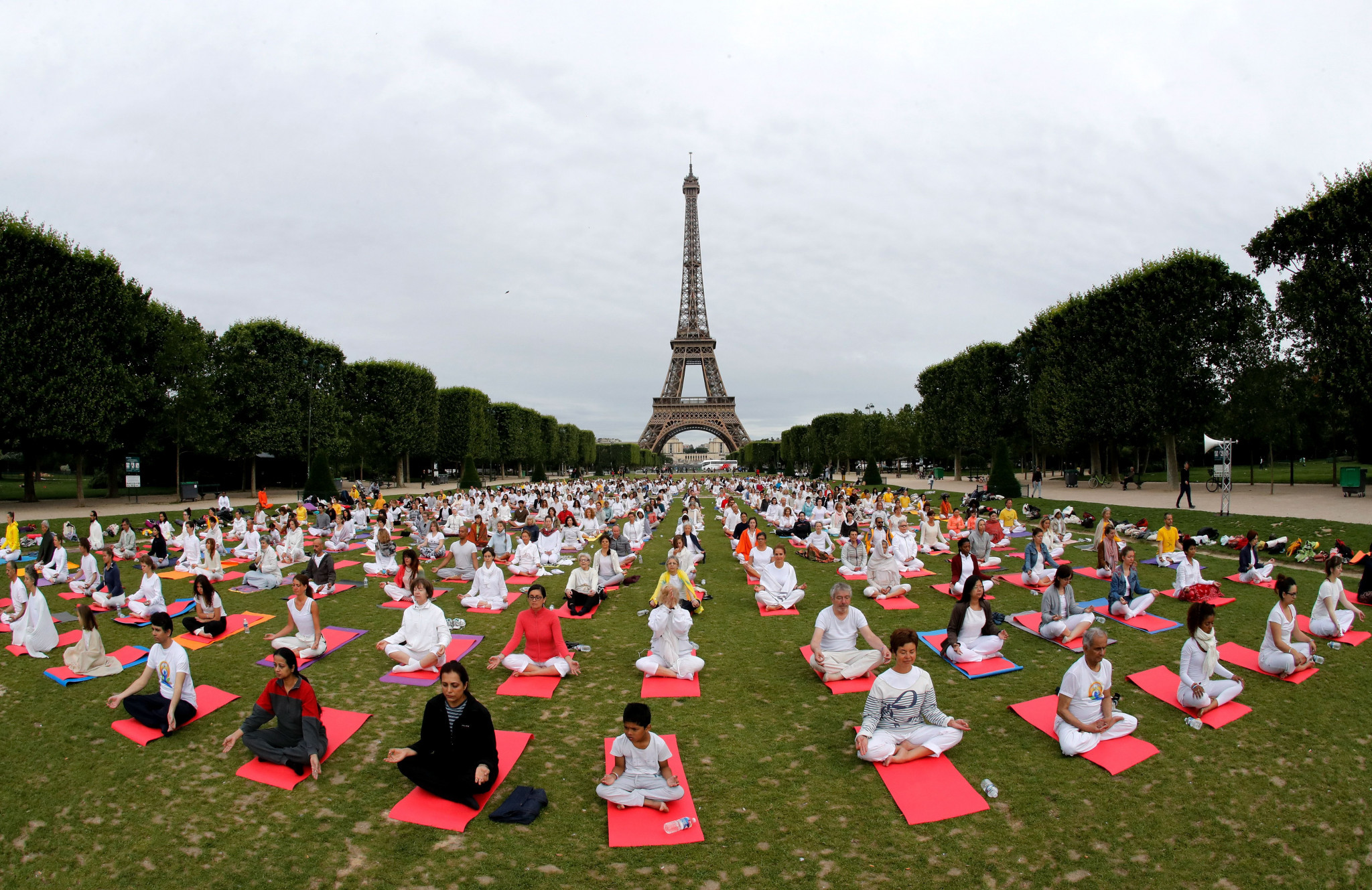 International Yoga Day is celebrated today at the Champs de Mars - earmarked for badminton by Paris 2024 ©Getty Images  