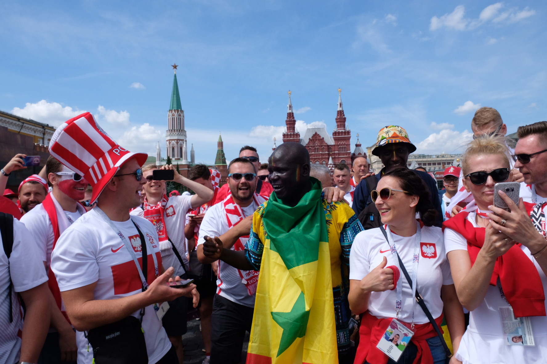 Fans of Poland and Senegal mingle together before their match ©Getty Images