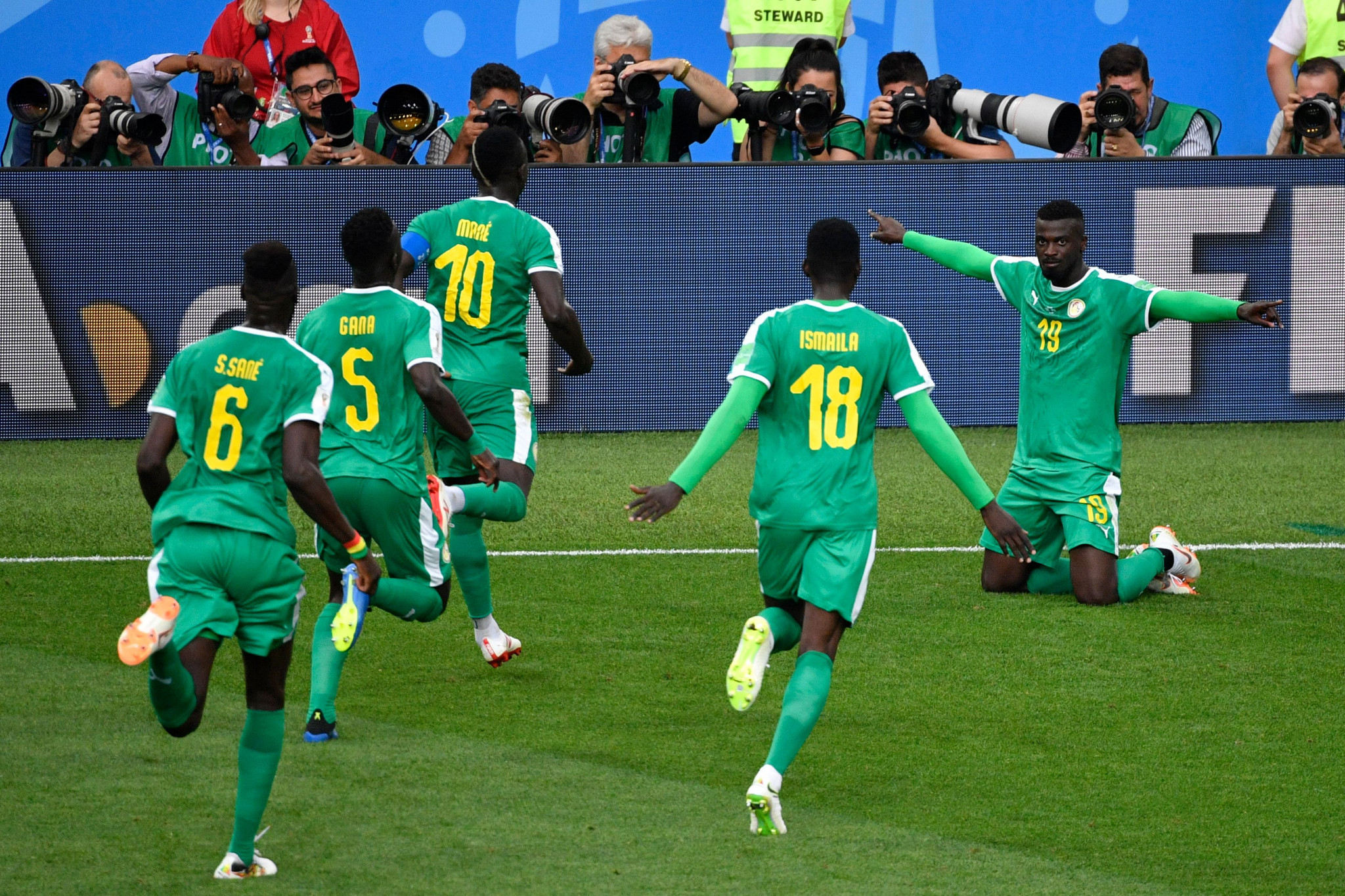 Senegal players celebrate a goal against Poland ©Getty Images