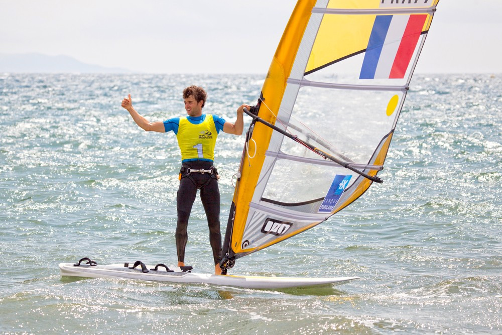 Frenchman Pierre Le Coq took gold in the men's RSX to the delight of the home crowd