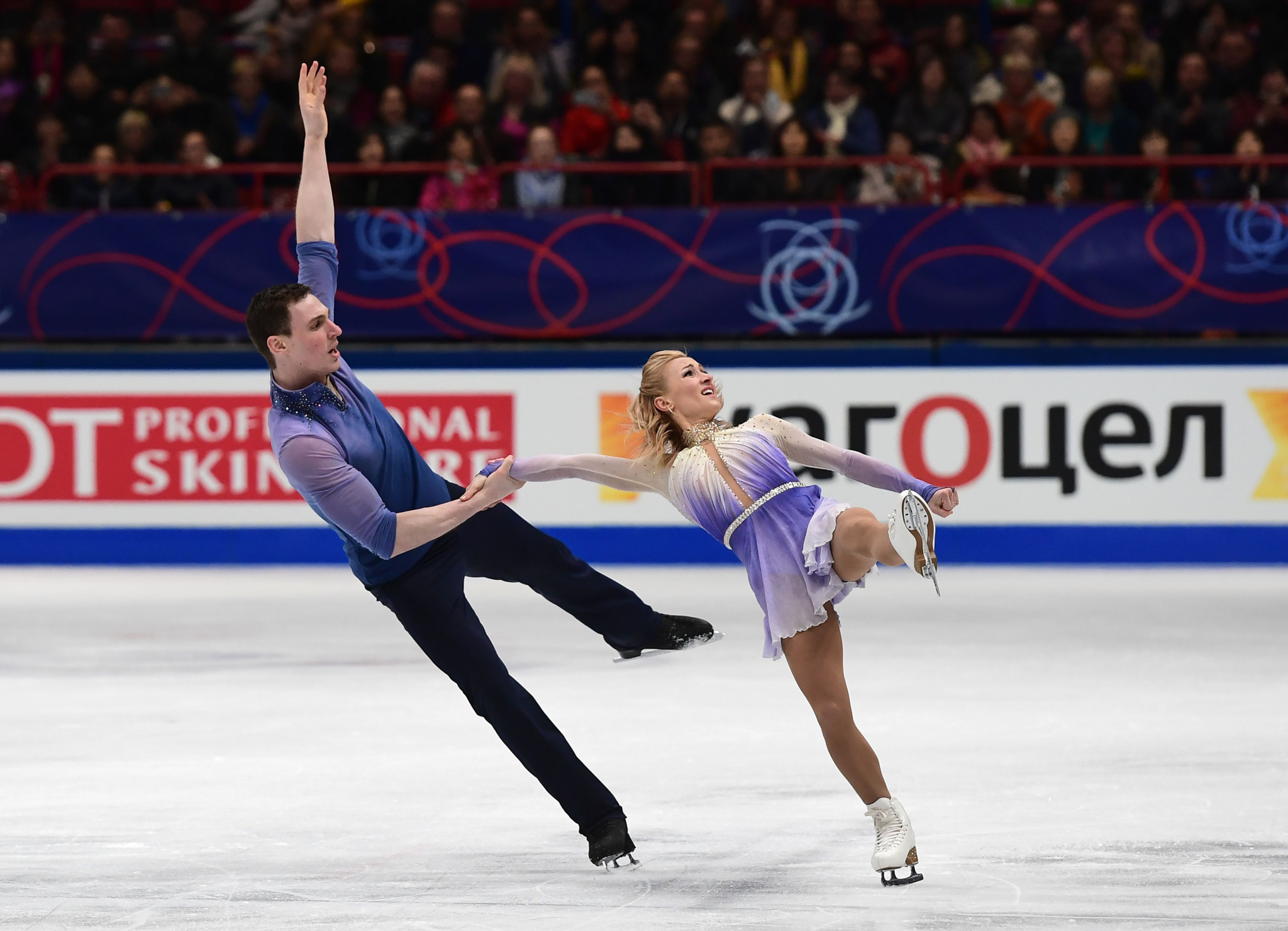 Germany's Aliona Savchenko and Bruno Massott won gold in the pairs event, despite Huang Feng 