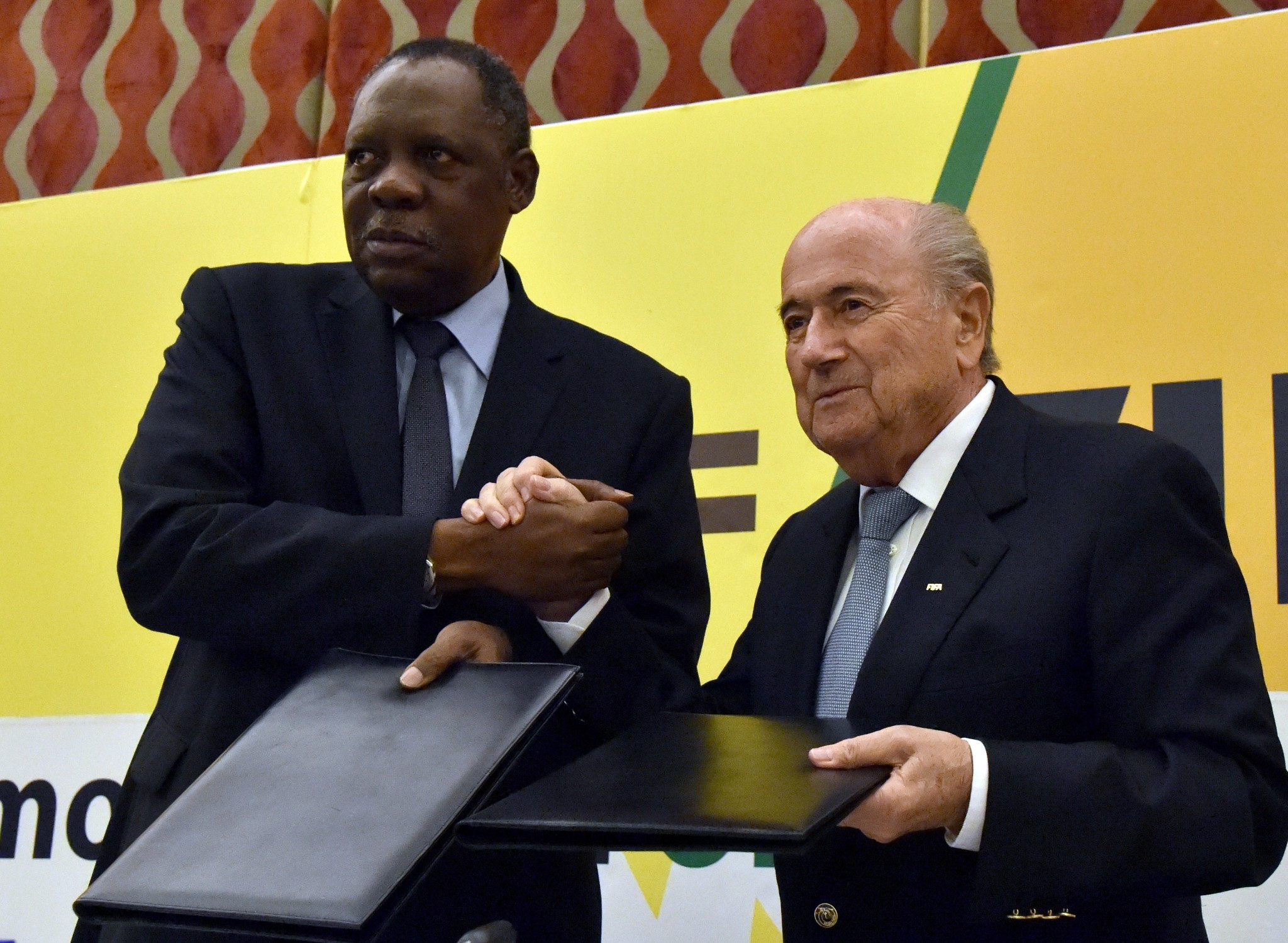Issa Hayatou (left) has been confirmed as the interim FIFA President ©Getty Images