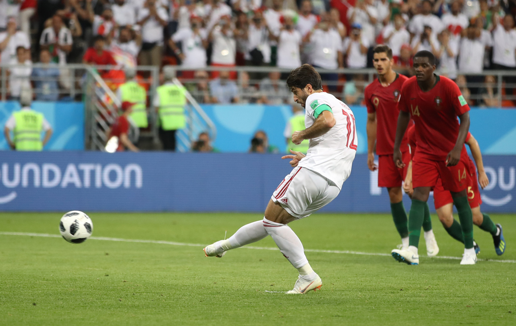 Karim Ansarifard's spot-kick three minutes into stoppage time earned Iran a point and condemned Portugal to second place in a controversial end to Group B ©Getty Images
