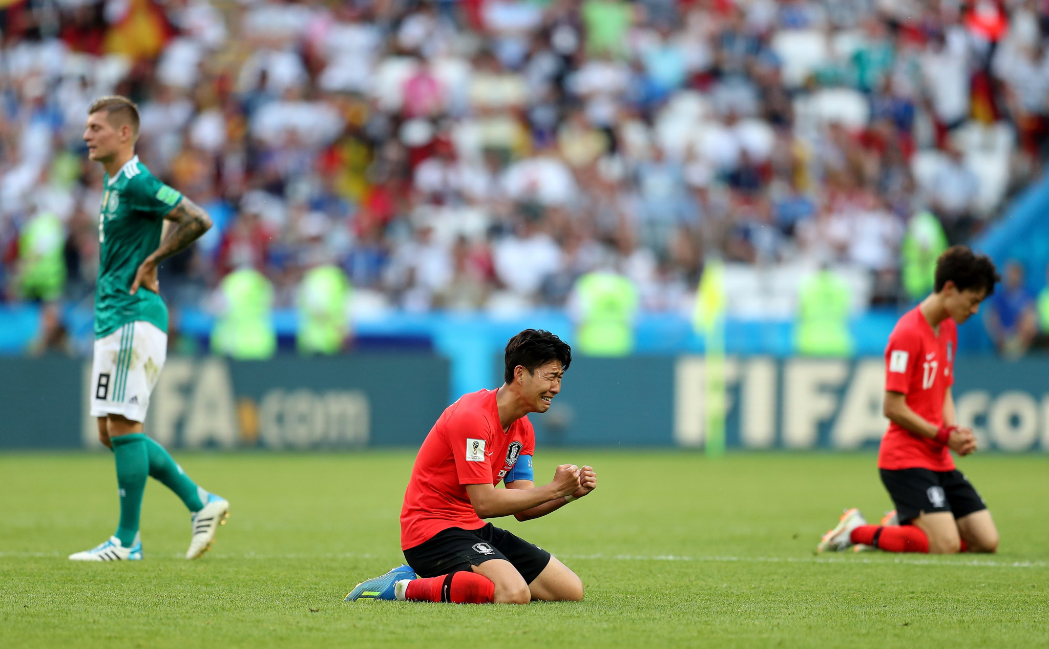 Son Heung-min sinks to his knees after the South Korean success ©Getty Images