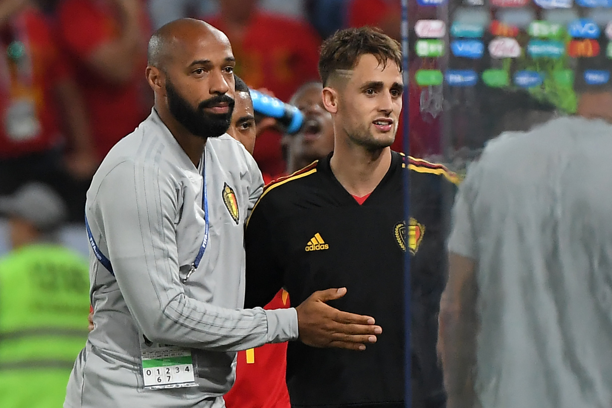 Belgium goalscorer Adnan Januzaj, left, is congratulated by assistant coach Thierry Henry ©Getty Images