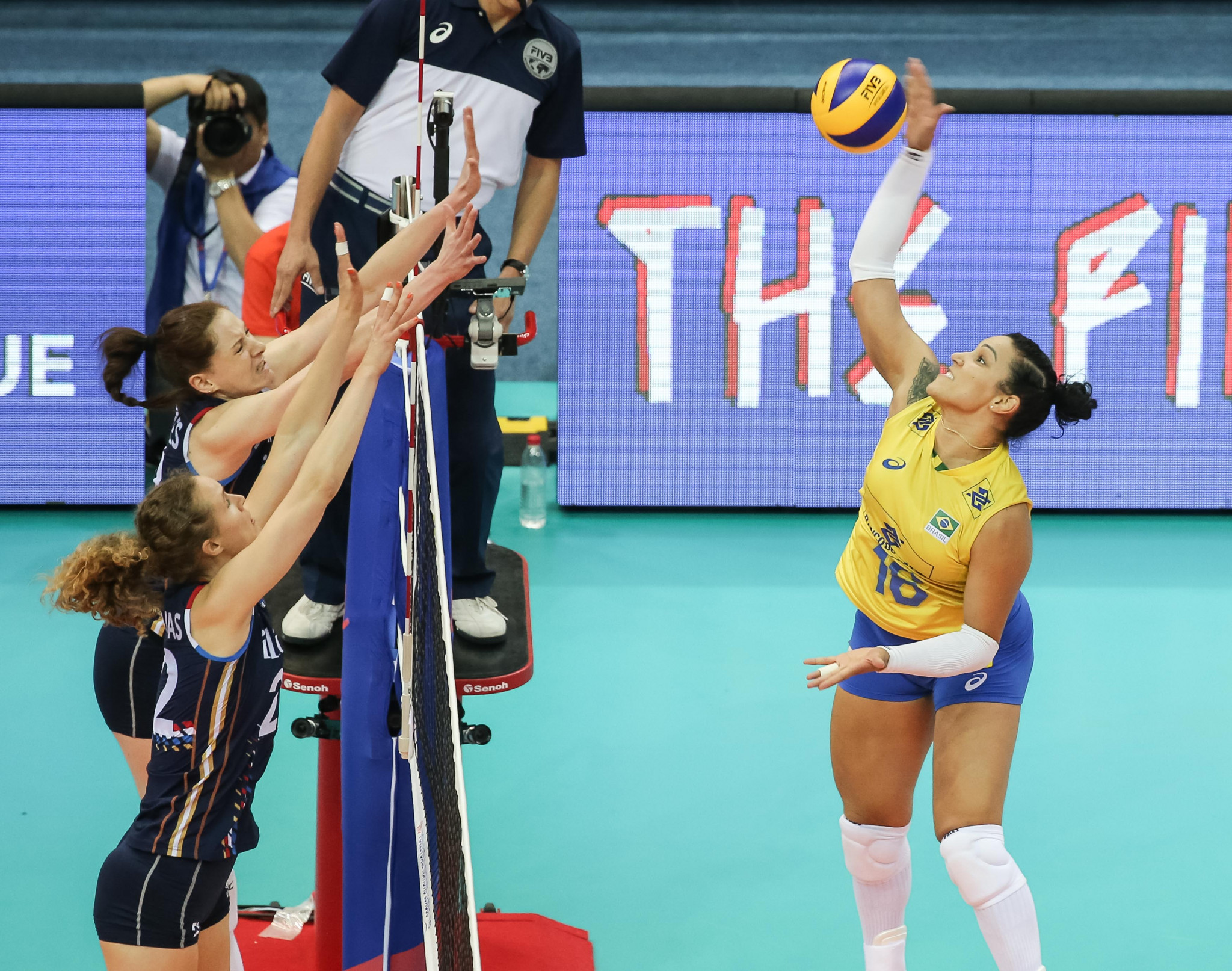Brazil have also reached the last four with a 100 per cent record ©FIVB