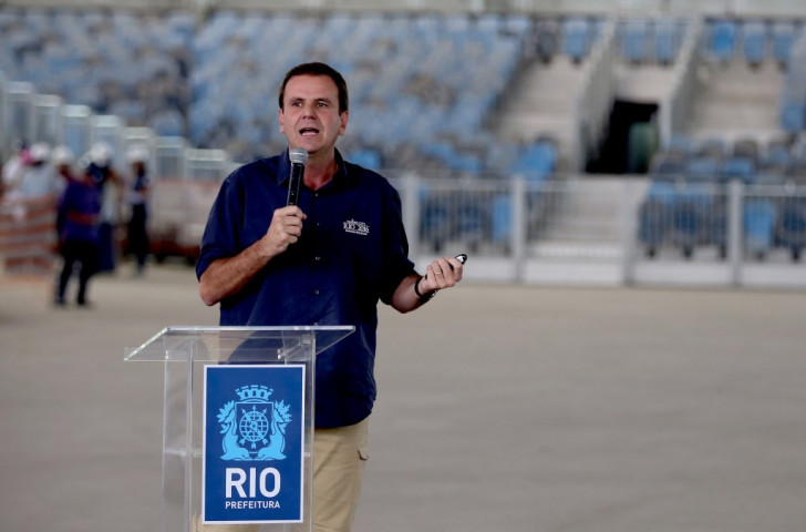 The Mayor of Rio, Eduardo Paes, pictured at the press conference marking One Year To Go until the 2016 Olympics, has been heavily criticised by swimming's world governing body over facilities and hazardous water conditions ©Getty Images