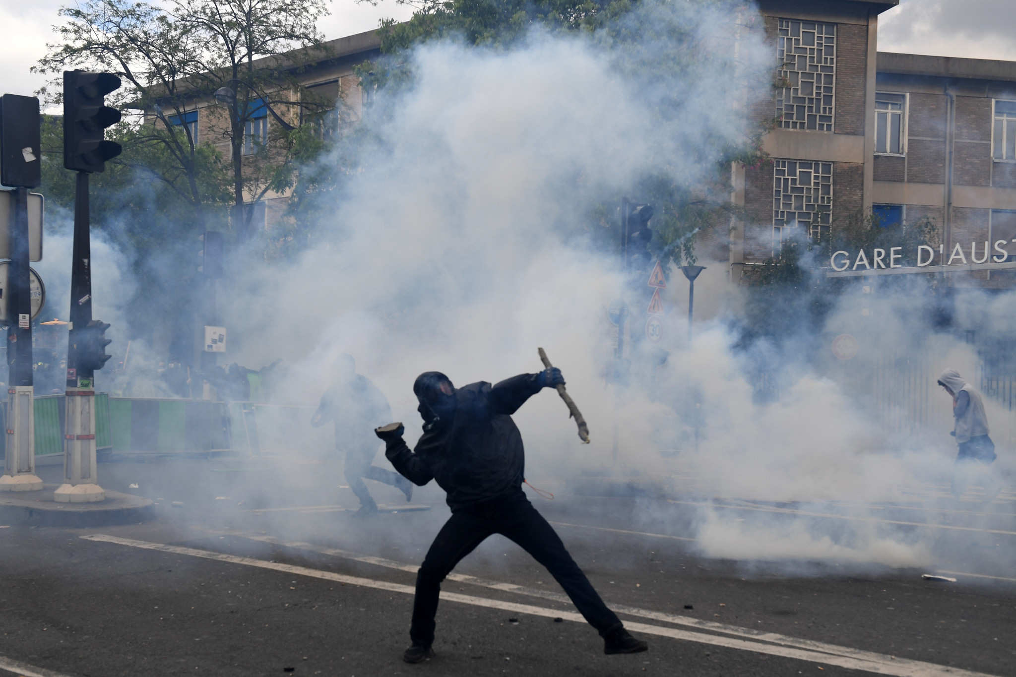 Protesters were in the streets of Paris on May Day this year, 50 years after the demonstrations involving millions of students and striking workers - but the change to open tennis was prompted not by revolutionary tendencies, but commercial imperatives ©Getty Images