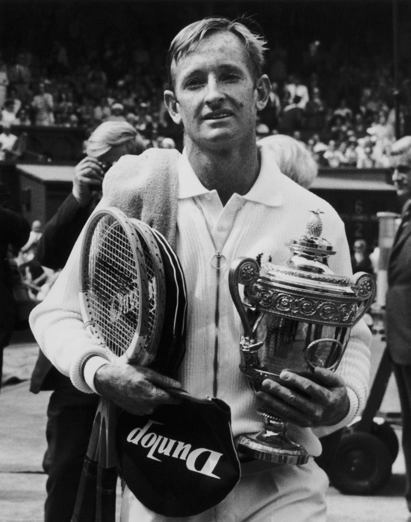 Rod Laver pictured with the men's trophy after the first Wimbledon final of the open era in 1968, and six years after winning his first title there ©Getty Images