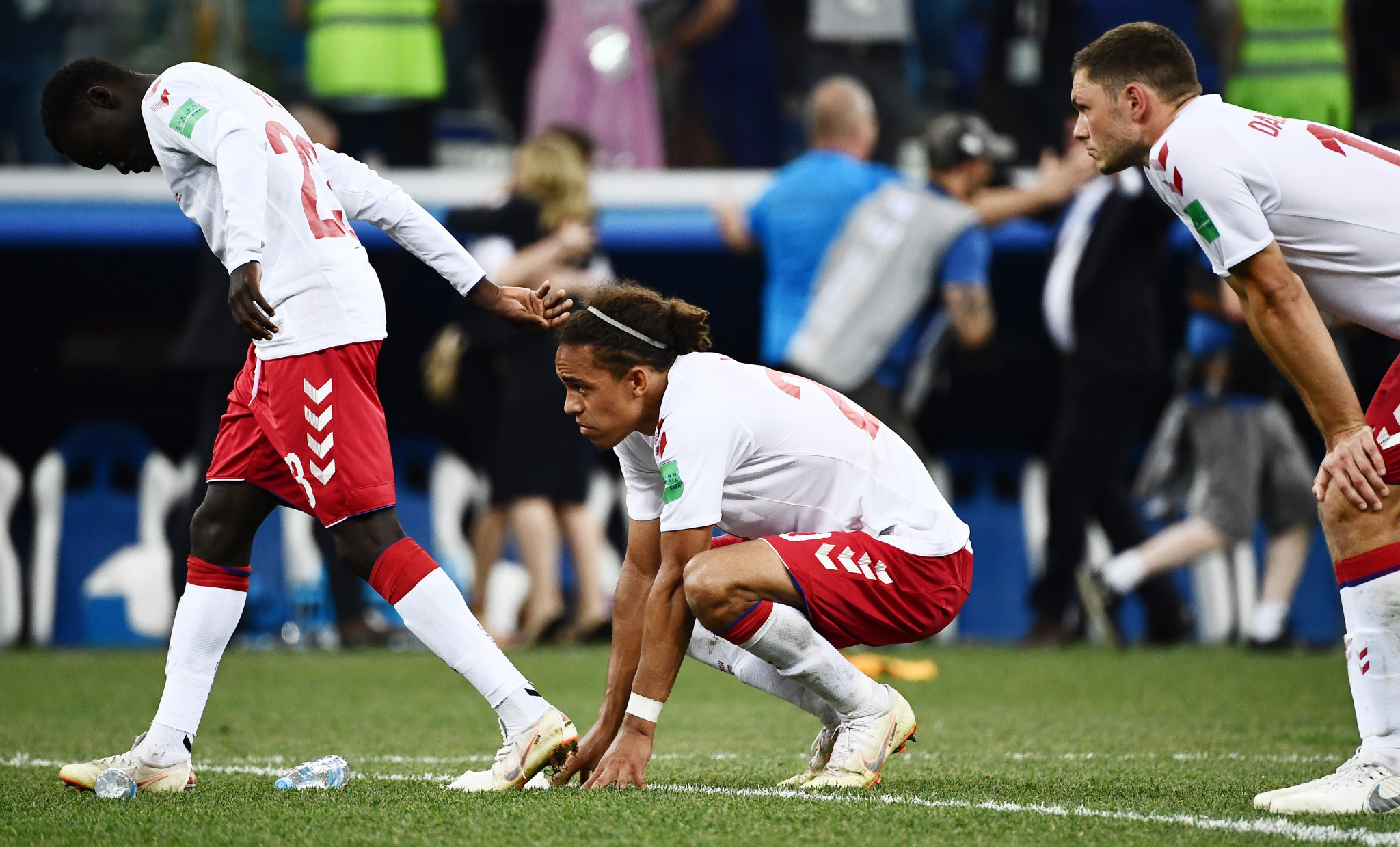Denmark sink to the ground after their agonising defeat ©Getty Images