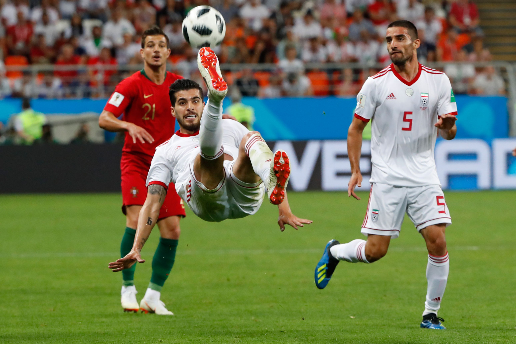 Saeid Ezatolahi makes a clearance during the FIFA World Cup match between Iran and Portugal ©Getty Images