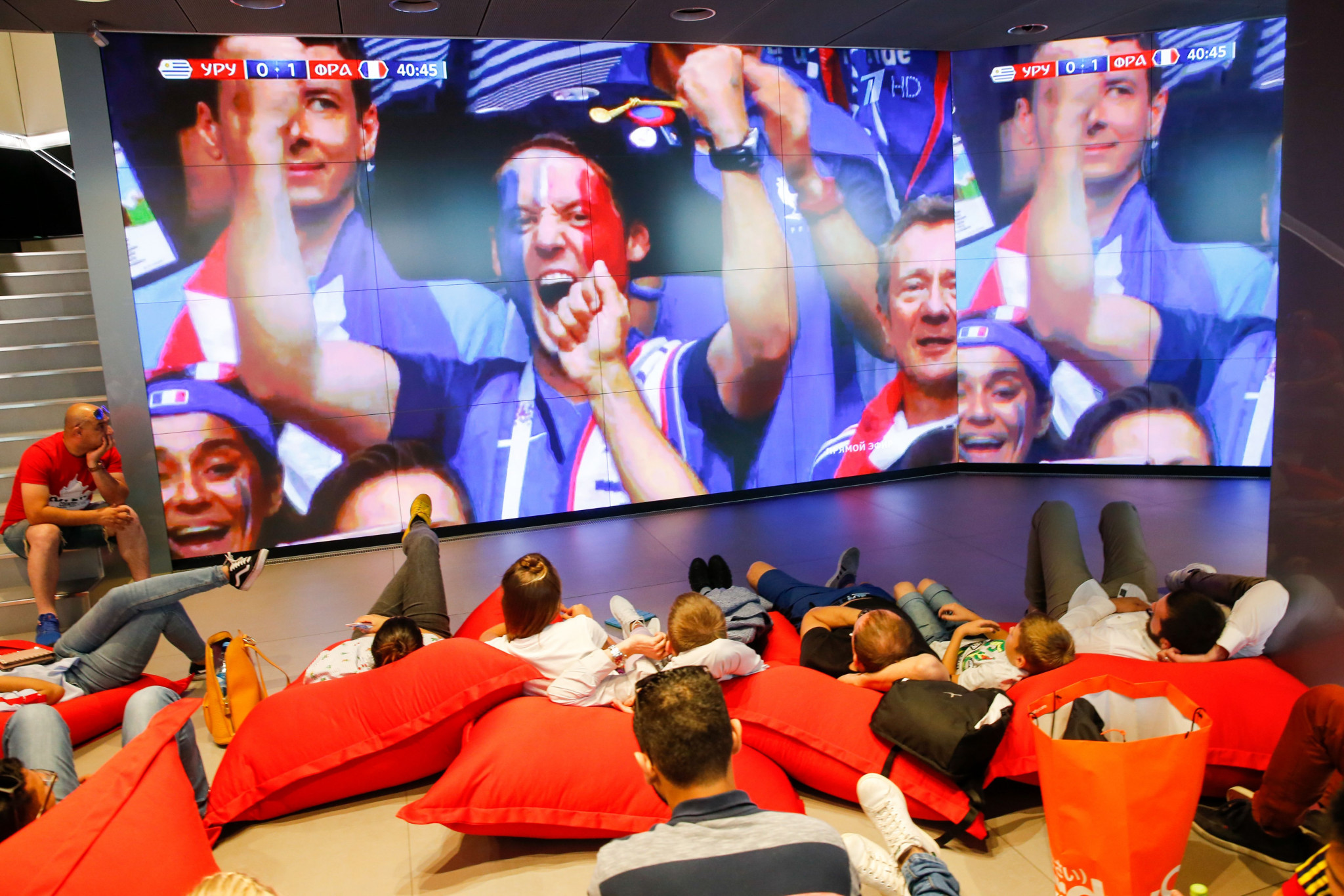 Fans watch the match unfold on a giant screen in Moscow ©Getty Images