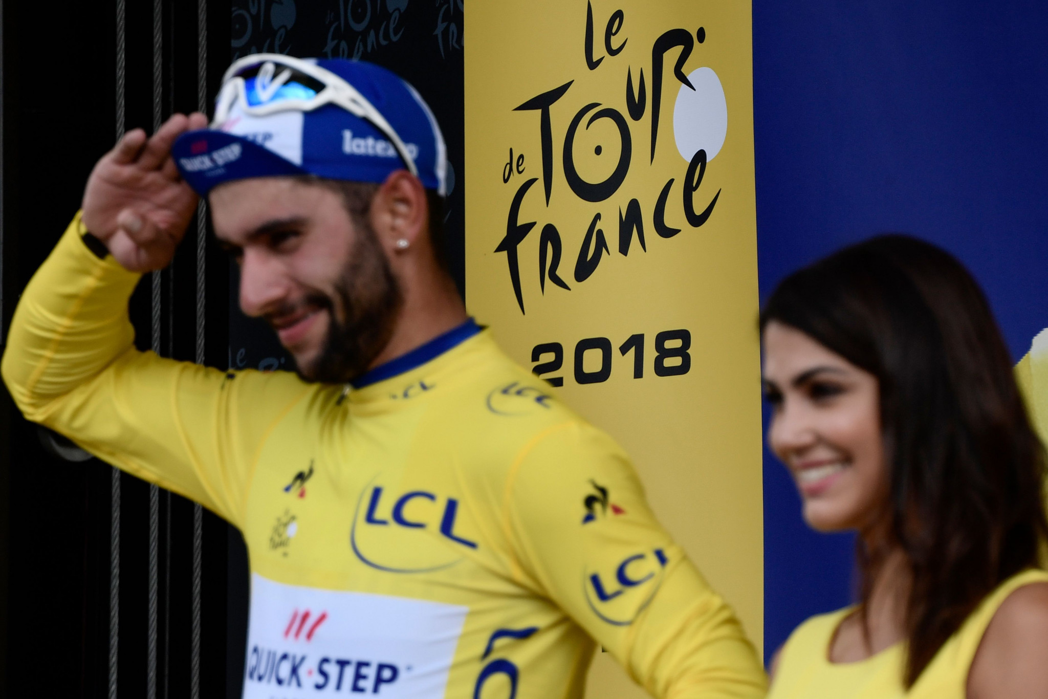 Gaviria takes Tour de France yellow jersey on debut as favourites suffer in dramatic final kilometres