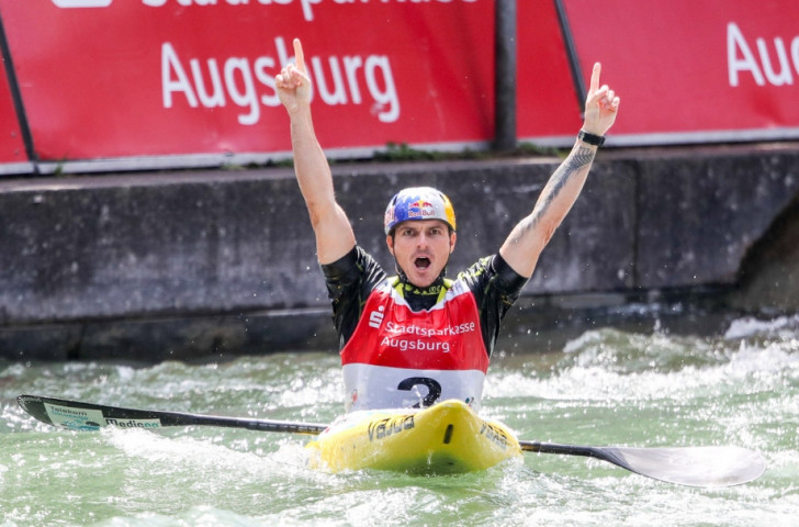 Slovenia's Peter Kauser salutes his K1 win at the ICF Canoe Slalom World Cup in Augsburg ©ICF