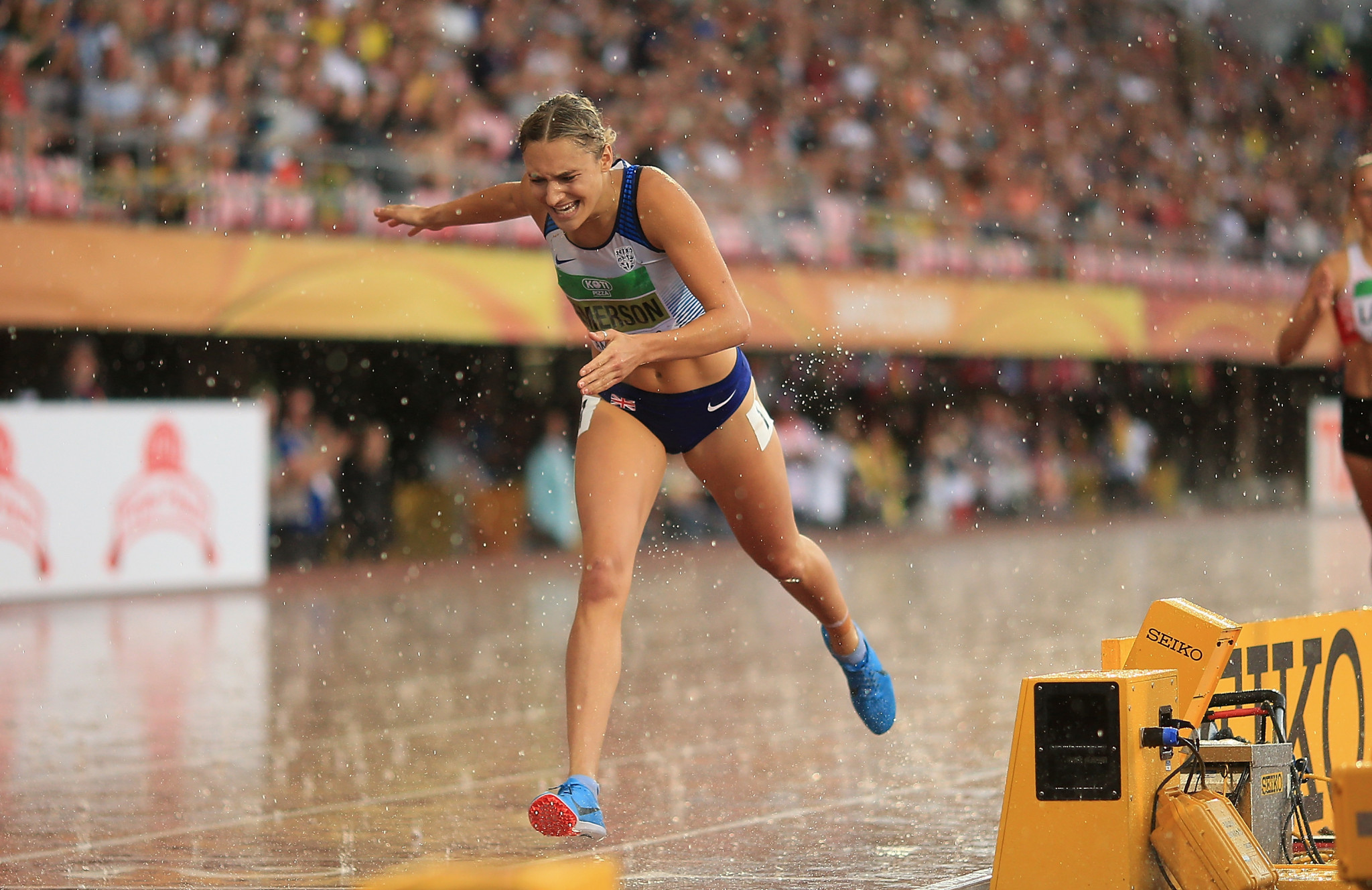Britain's Niamh Emerson secures world under-20 heptathlon gold as she wins the concluding 800m in driving rain at Tampere's Ratina Stadium ©Getty Images  