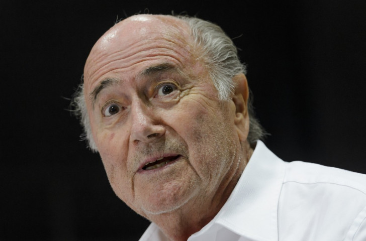 FIFA President Sepp Blatter has reportedly told colleagues he will not leave Switzerland during the ongoing investigations into world football's governing body