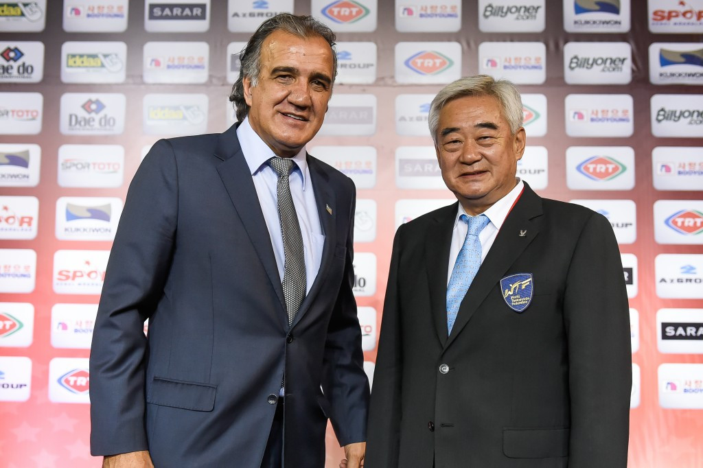 Amaury Russo, pictured left with World Taekwondo Federation President Chungwon Choue, said the points being raised at the General Assembly are important ©WTF