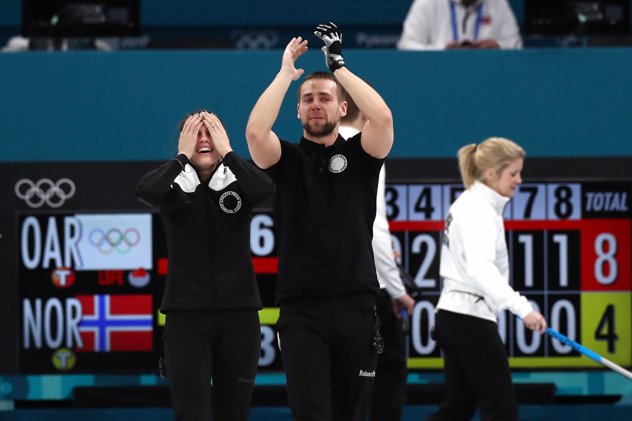 Aleksandr Krushelnitckii and wife Anastasia Bryzgalova were stripped of their Olympic mixed doubles curling bronze medals ©Getty Images