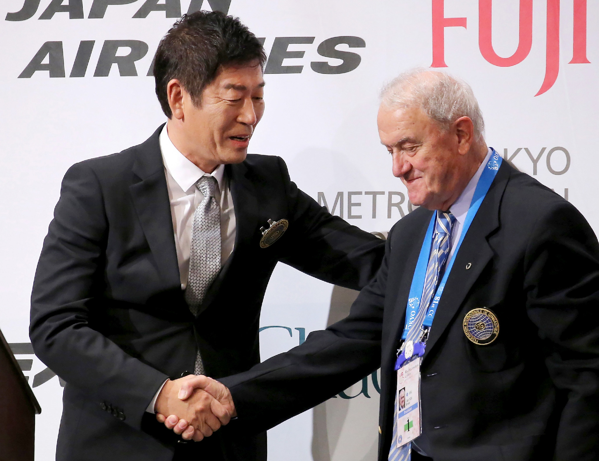 Morinari Watanabe, left, is the first IOC member from FIG since Bruno Grandi, right ©Getty Images