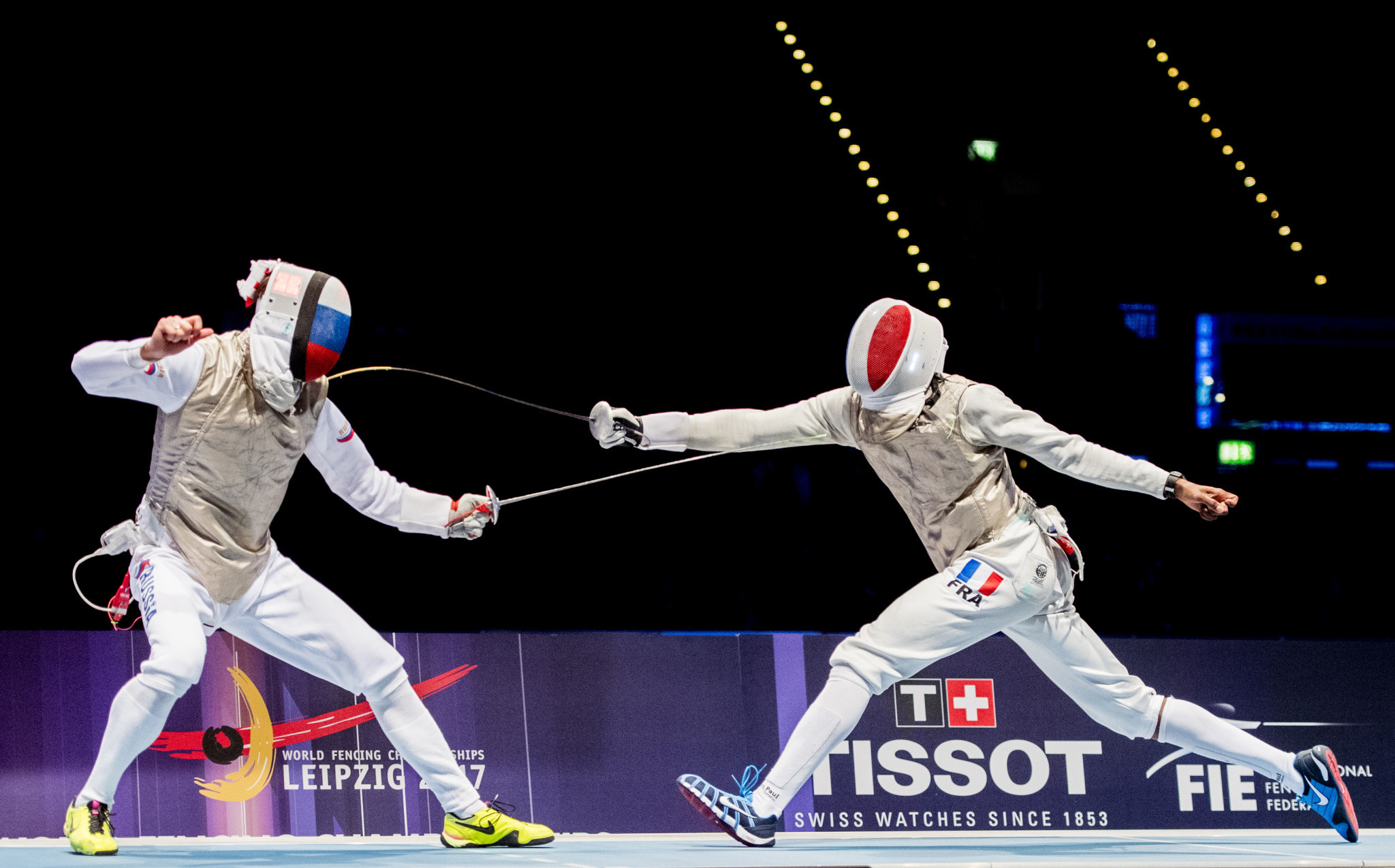 Russia's Dmitry Zherebchenko, left, will begin the defence of his men's foil title against Hamid Sintes of Algeria at the World Fencing Championships ©Getty Images