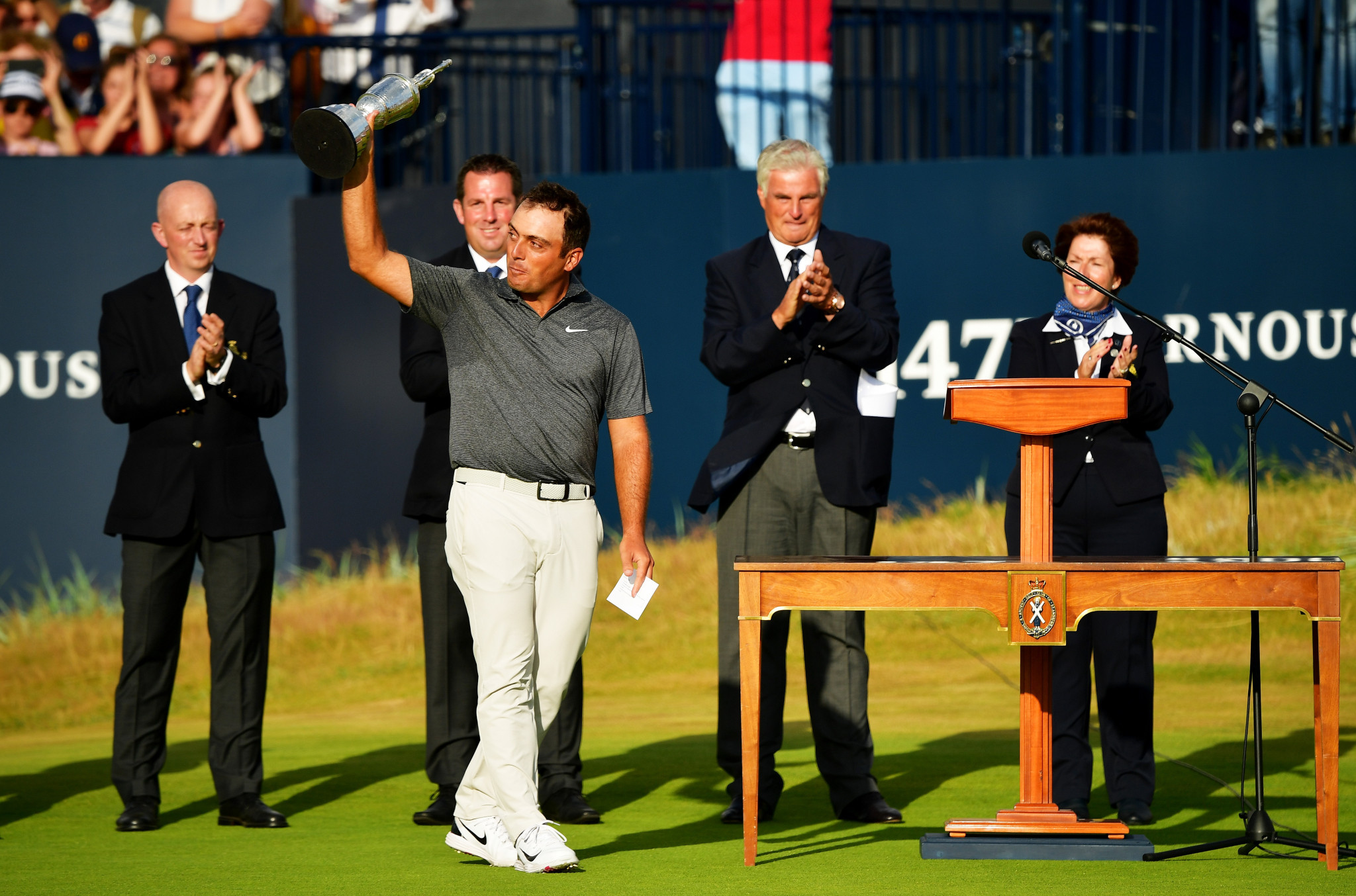 Molinari claims first major championship after emerging from pack to win The Open