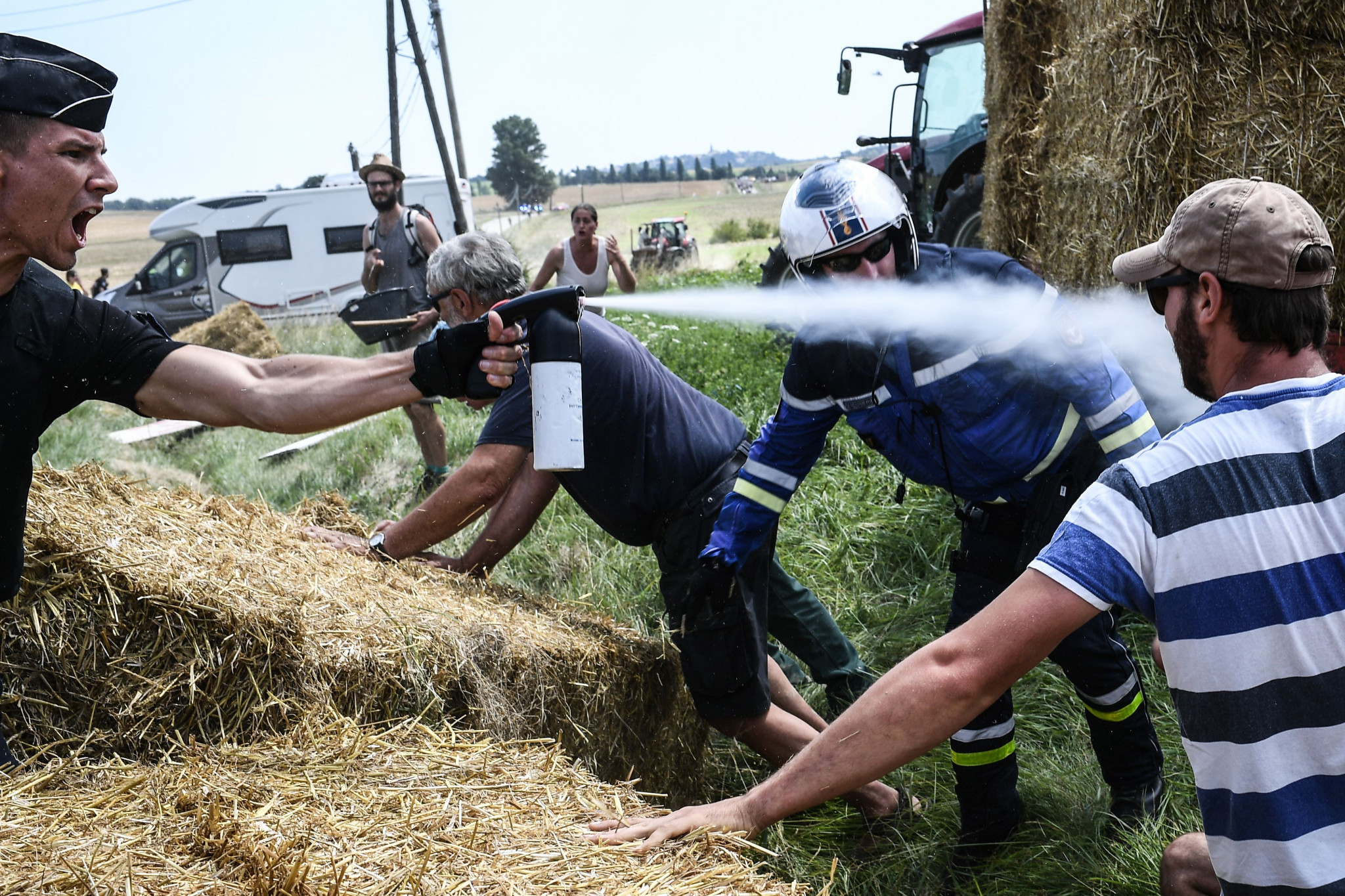 A protest by farmers delayed the stage while spray led to riders seeking treatment ©Getty Images