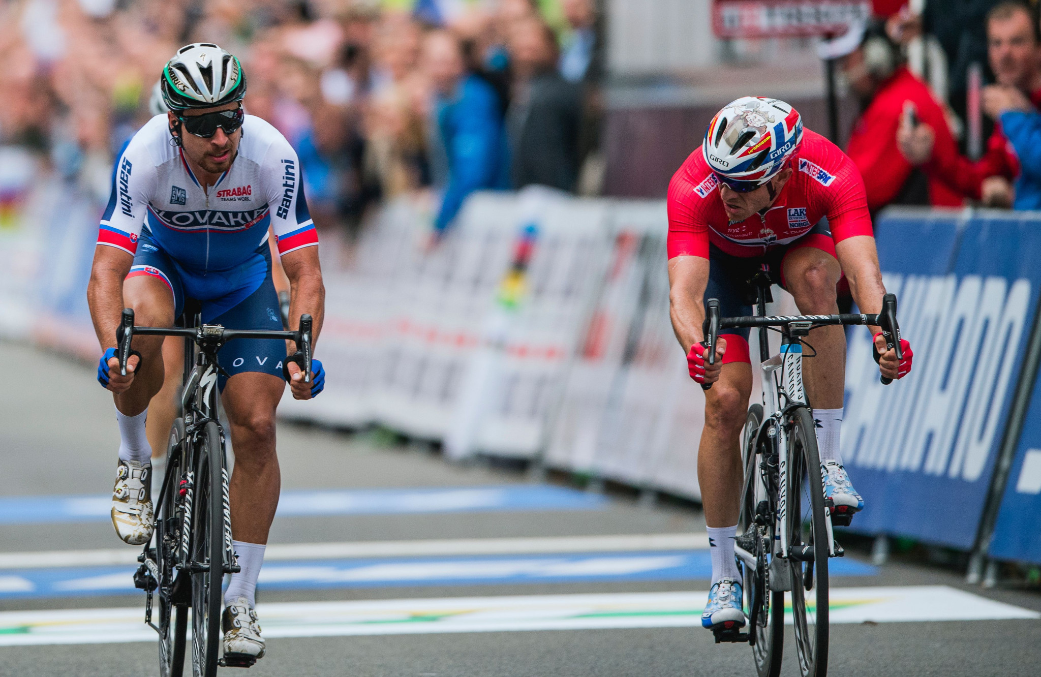 Slovakia's Peter Sagan, left, won the men's elite road race at the 2017 Road World Championships in Bergen in Norway for the third consecutive time ©Getty Images