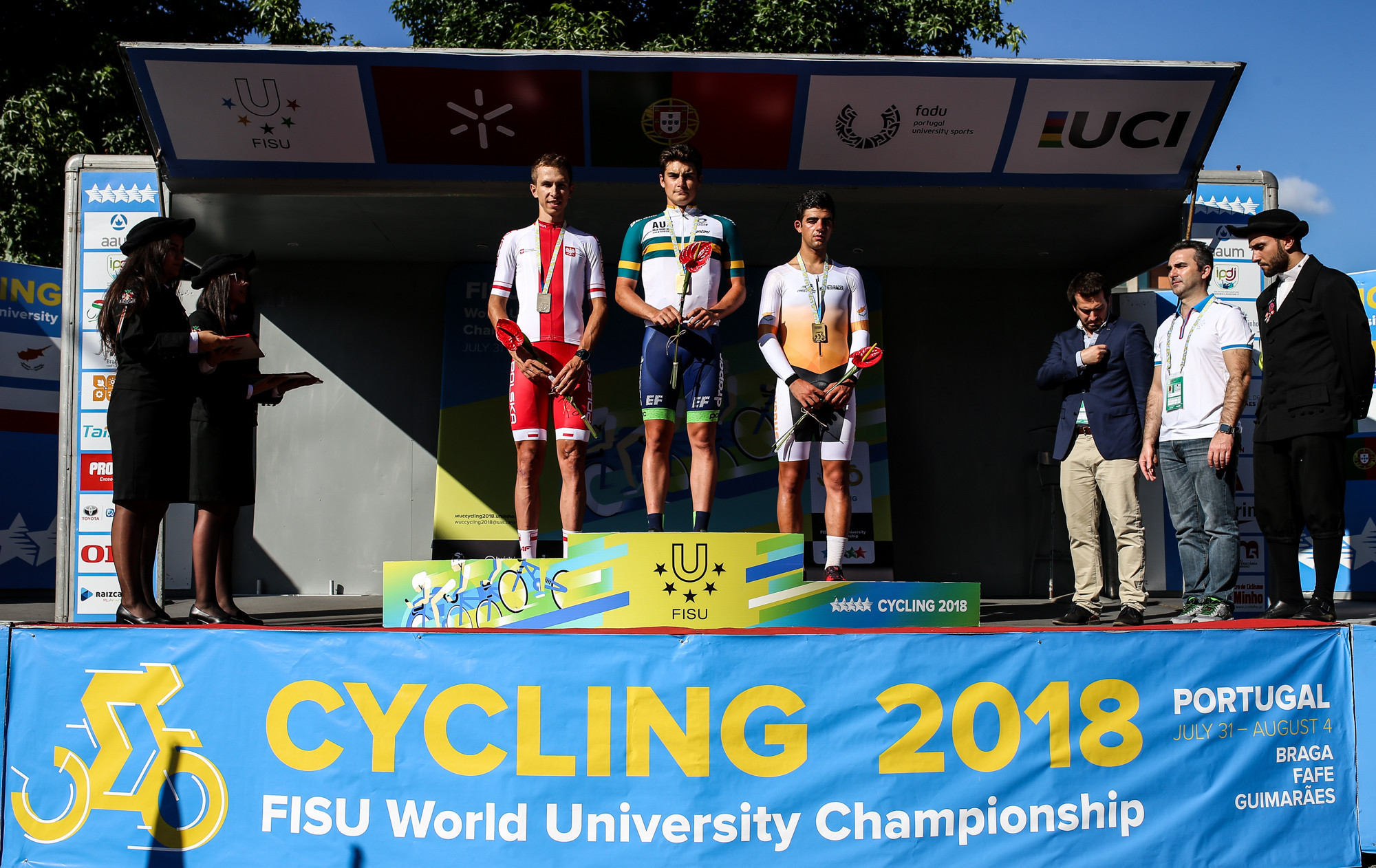 In the men's time trial, Andrew Magennis of Australia took gold ahead of Piotr Konwa, of Poland, left, with bronze going to Andreas Miltiadis of Cyprus ©FISU