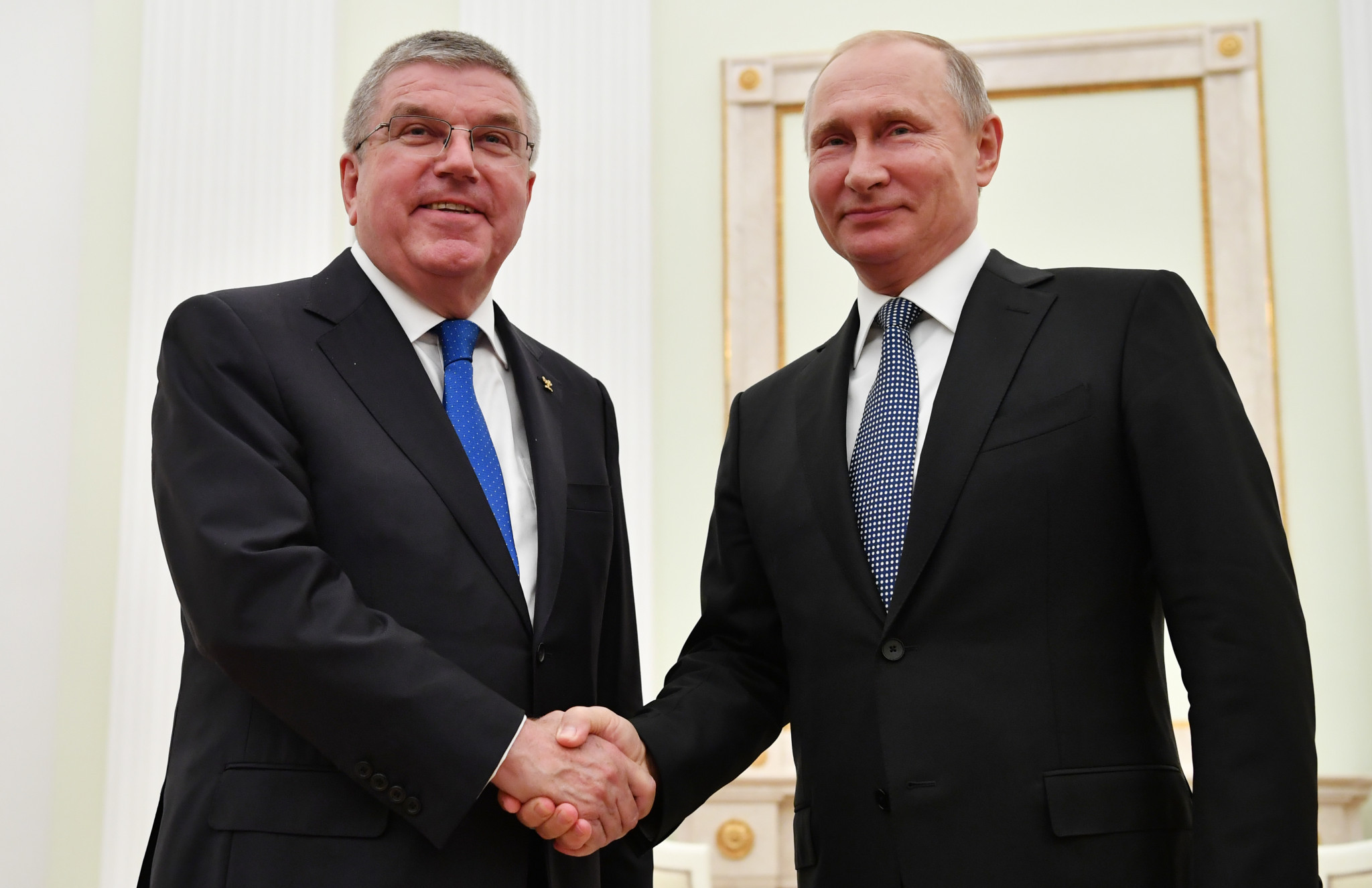 Thomas Bach, left, and Vladimir Putin met at the Kremlin shortly before the World Cup final ©Getty Images