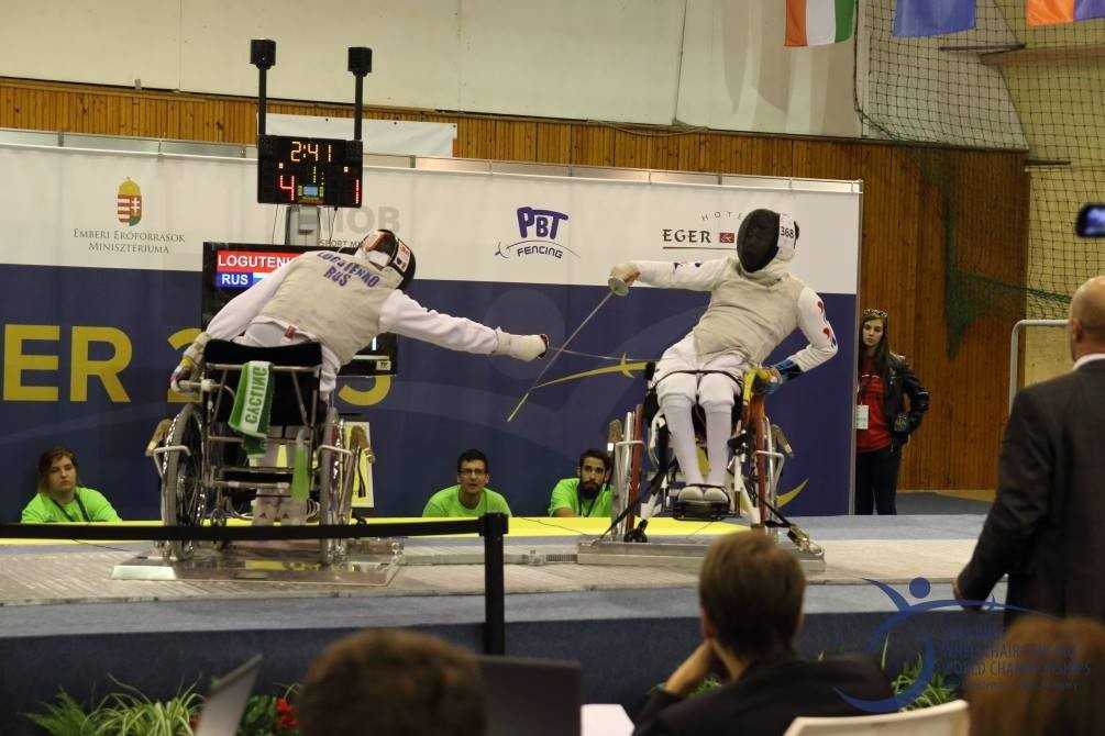 Russia's Alexander Lugotenko (left) was the star on another busy day of action at the World Wheelchair Fencing Championships ©Hungarian Paralympic Committee 