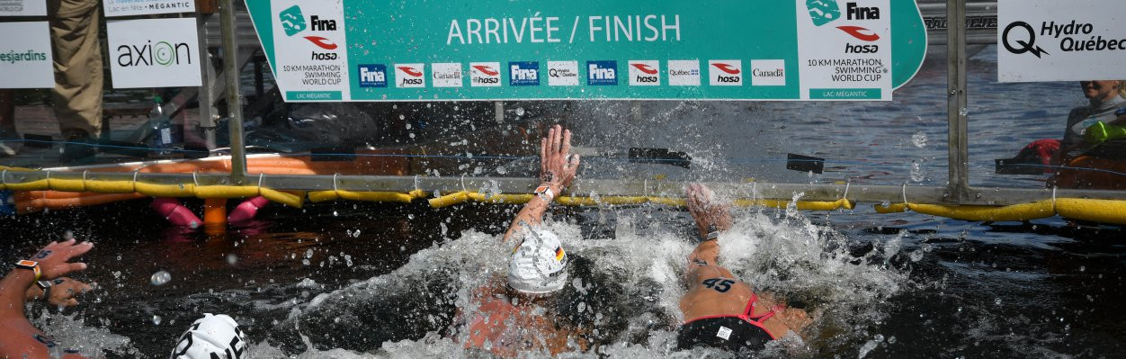 For the second race in a row a video replay was needed to decide the men's race on the FINA Marathon Swim World Series at Lac Megantic in Canada©FINA