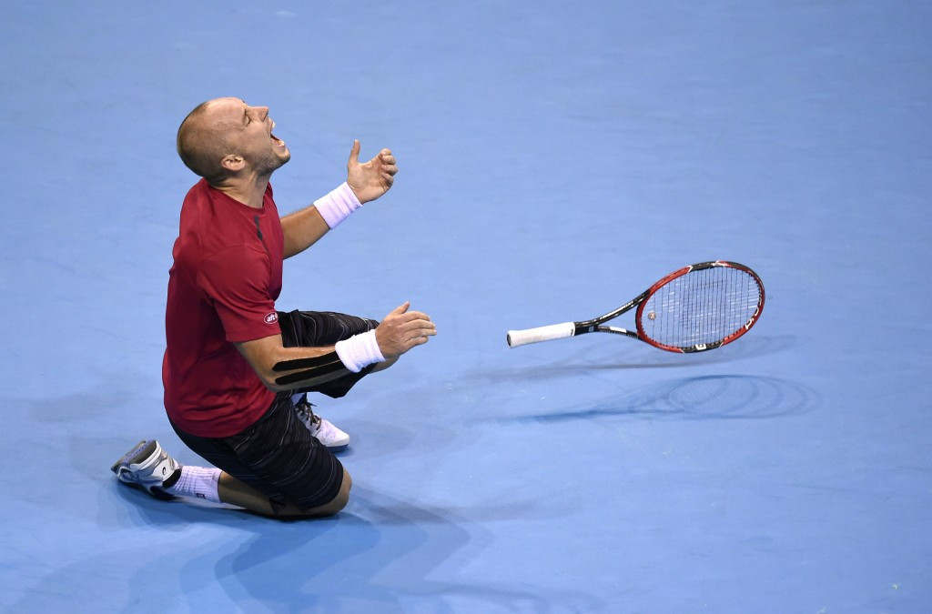 Steve Darcis of Belgium celebrates reaching the Davis Cup final. His country will host it on clay ©Getty Images 