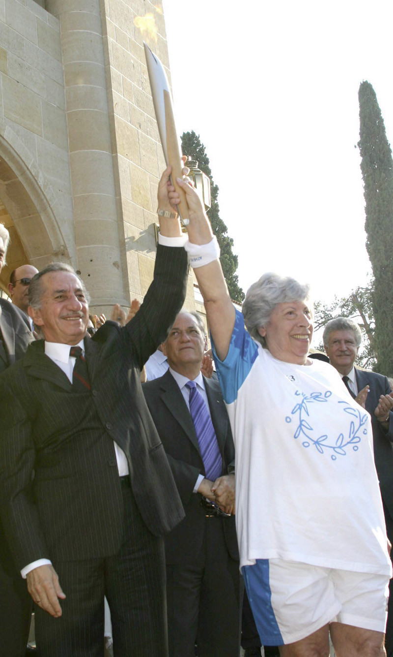 Iro Mitsidou carried the Olympic Torch in 2004 before the Athens Olympics ©COC