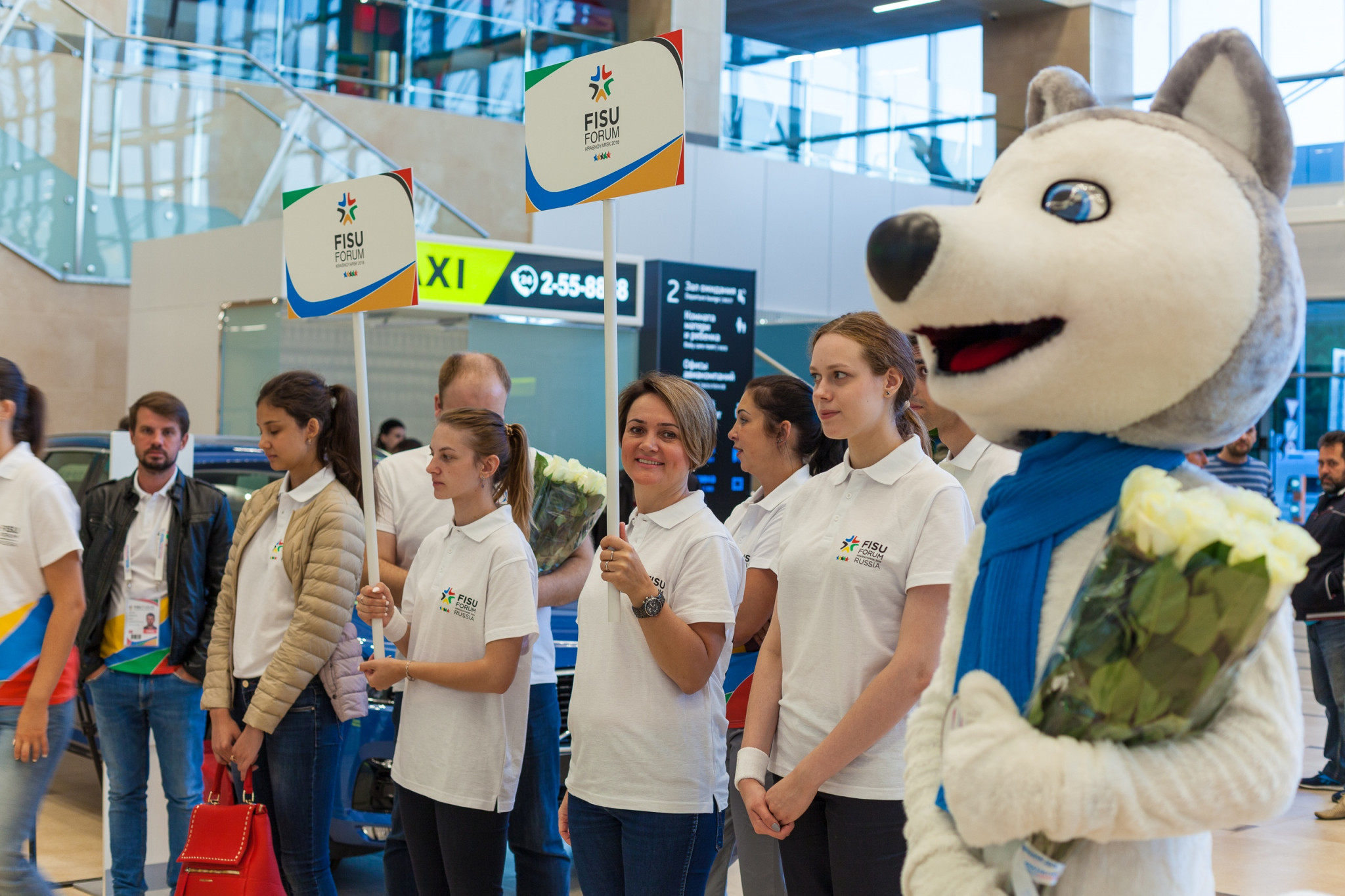 Visitors for the FISU Forum were greeted at the airport ©FISU