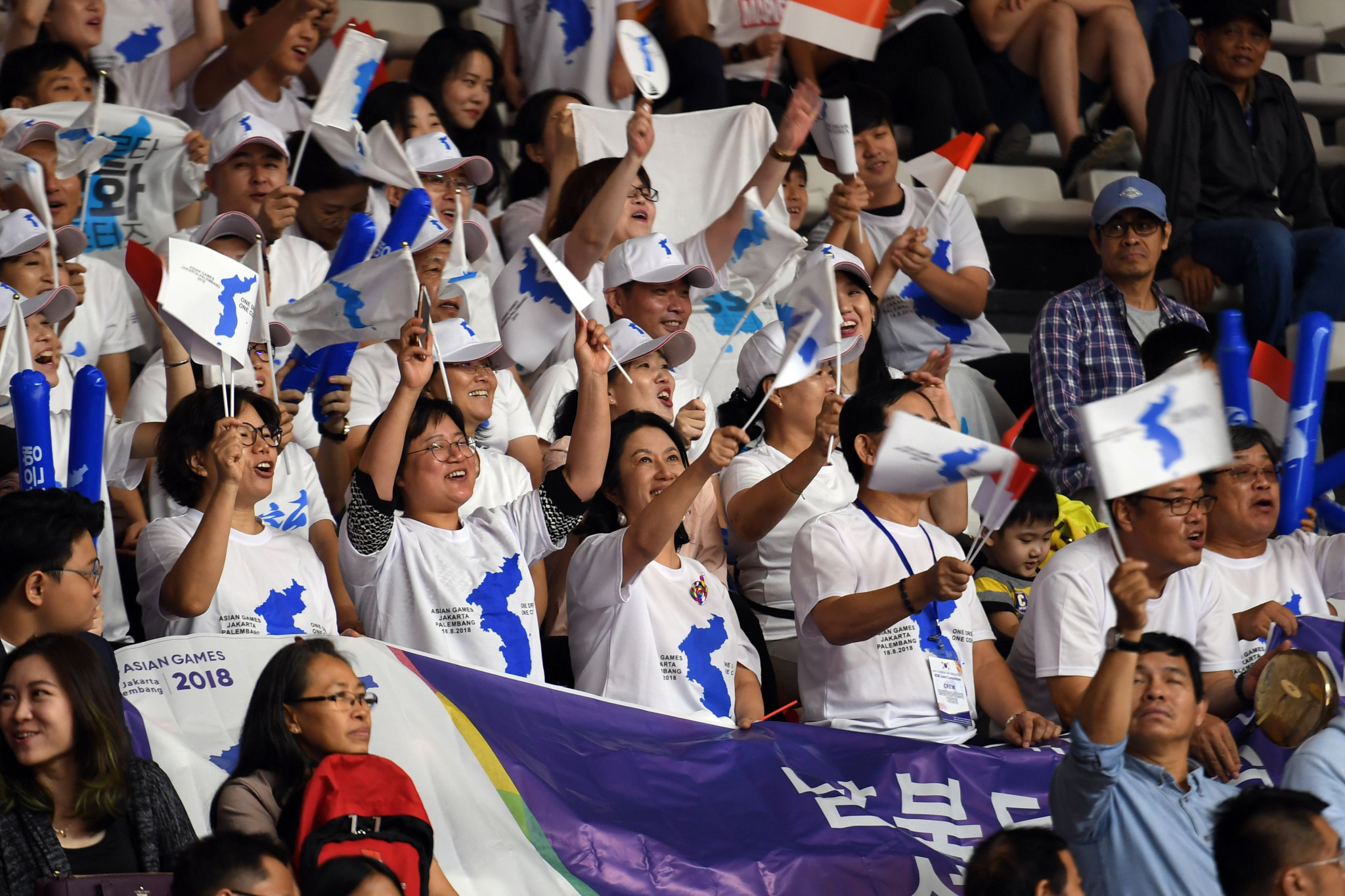 Fans cheer on the joint Korean team in Jakarta ©Getty Images