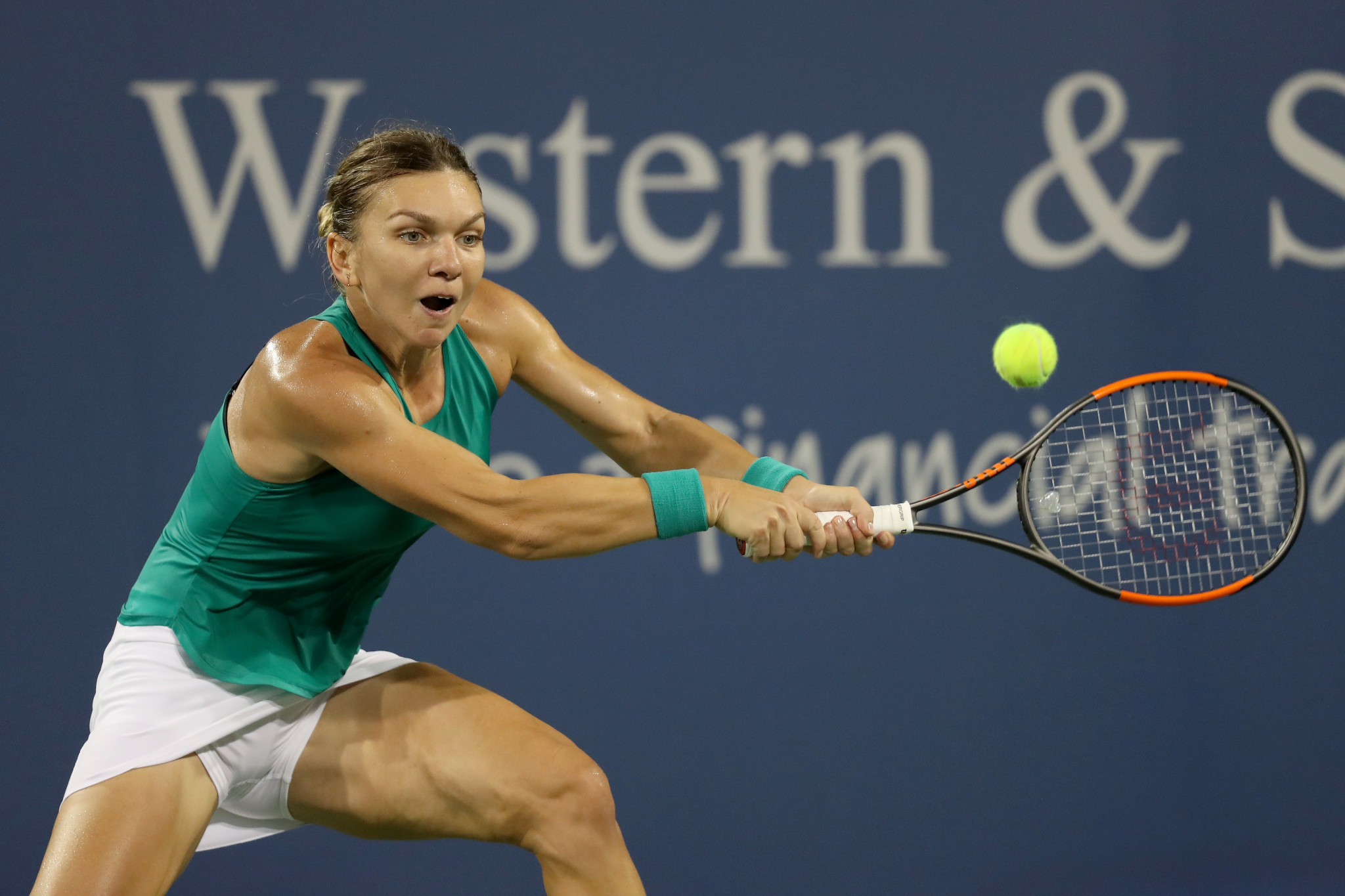 Simona Halep secured a second round victory on a day impacted by rain ©Getty Images
