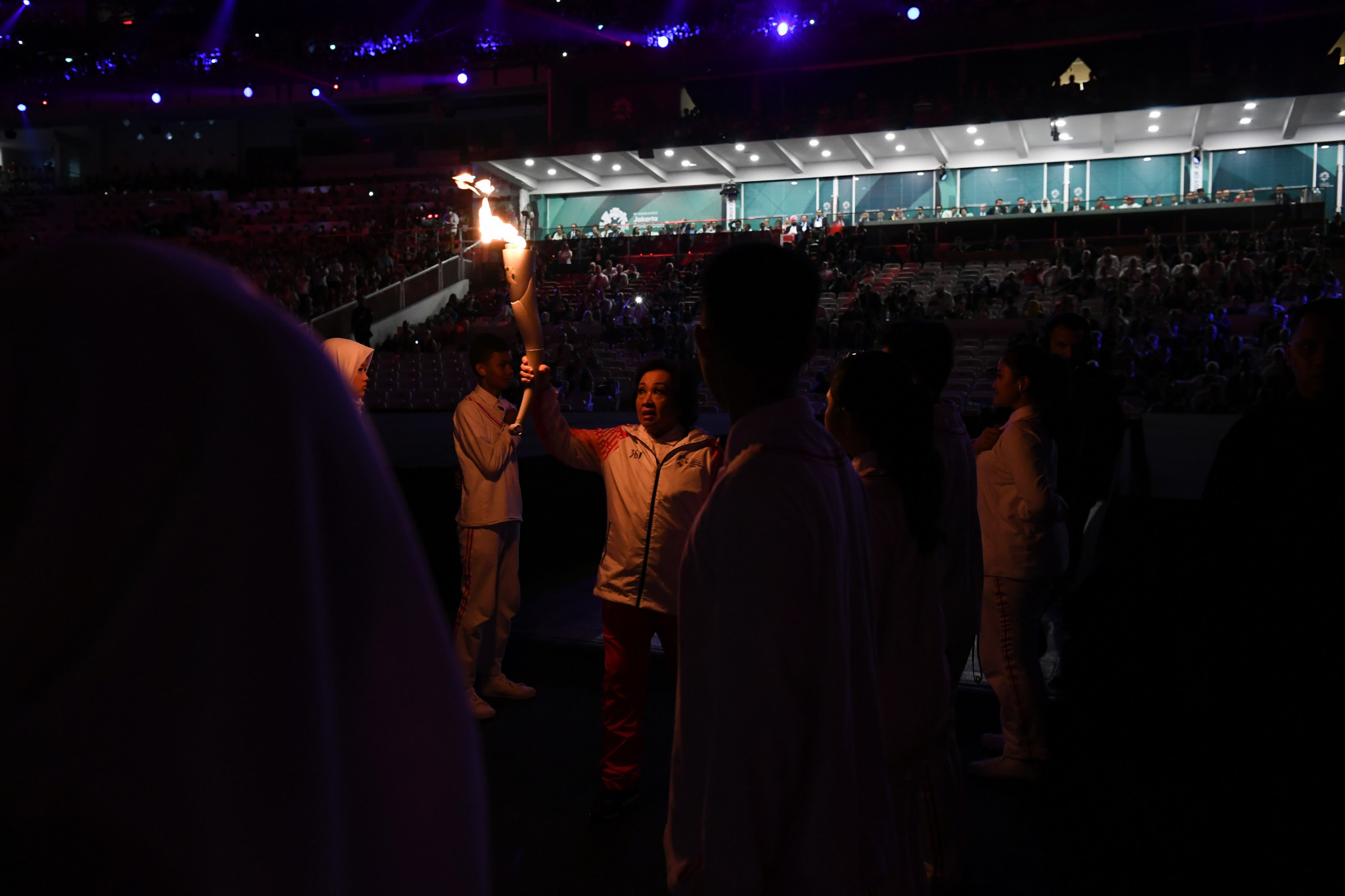 Having started its relay in New Delhi as is tradition, the flame arrived into the Stadium initially unnoticed ©Getty Images