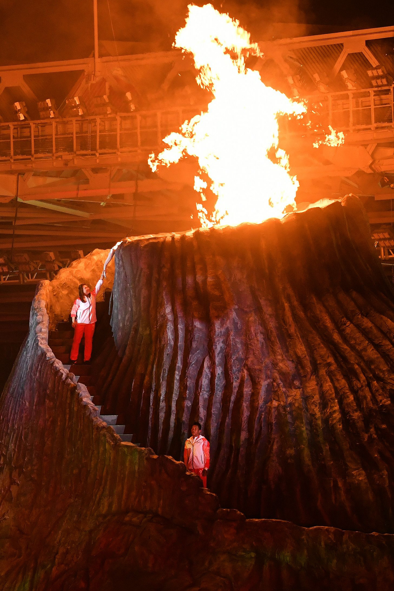 The cauldron, which was made to look like a volcano built into the stage, was lit by former Indonesian badminton star Susi Susanti, a two-time Asian Games bronze medallist ©Getty Images