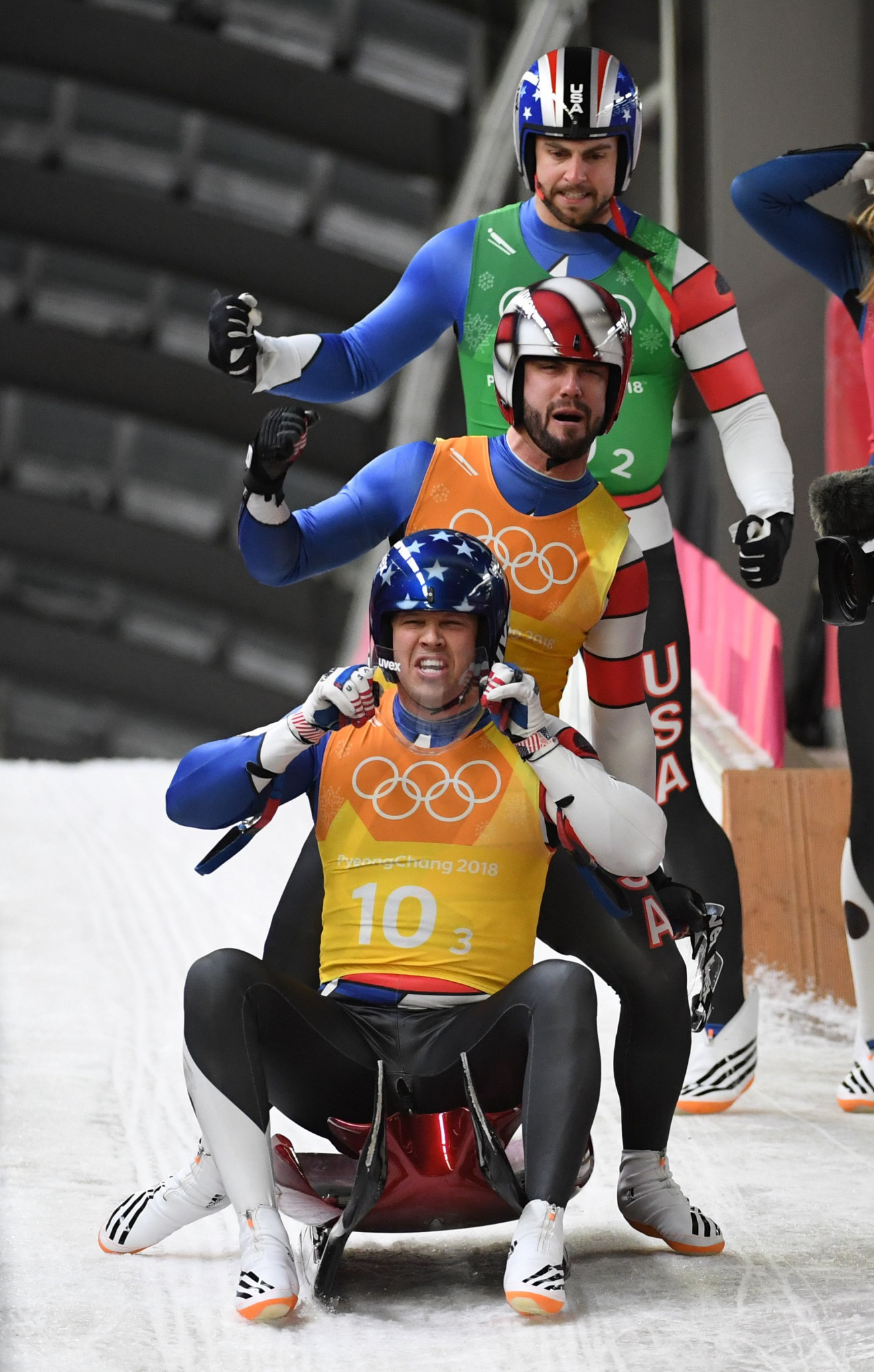 Matthew Mortensen, bottom, Jayson Terdiman, centre and singles luge athlete Chris Mazdzer pictured after competing in the team relay competition during the Pyeongchang 2018 Winter Olympics ©Getty Images  