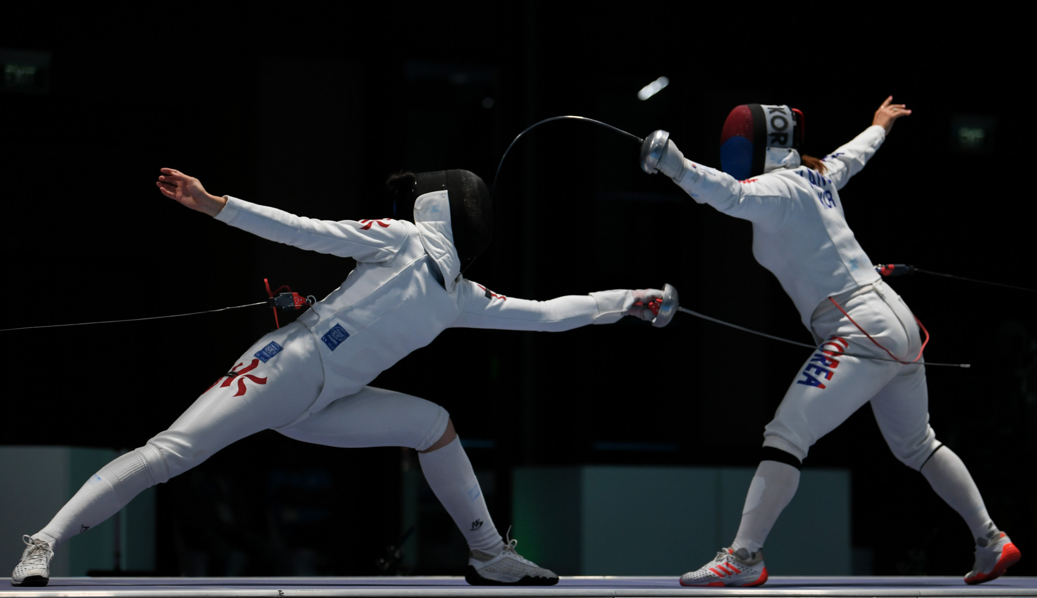 Youngmi Kang, right, won gold in the women's individual epee to make South Korea the most successful country in the event in Asian Games history ©Getty Images 