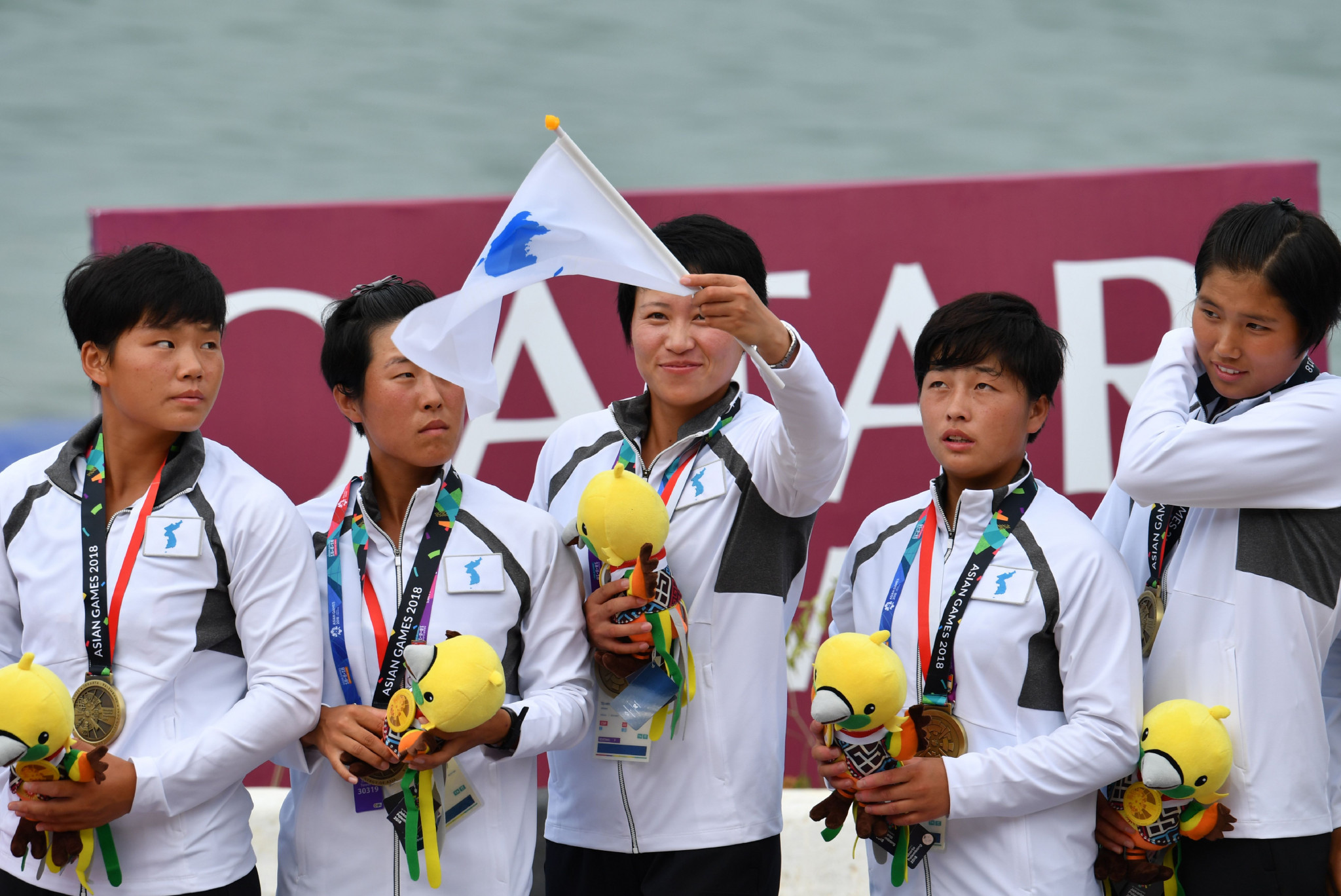 The Unified Korean team celebrate their bronze medal-winning performance in the women’s 200 metres dragon boat race at the 2018 Asian Games ©Getty Images
