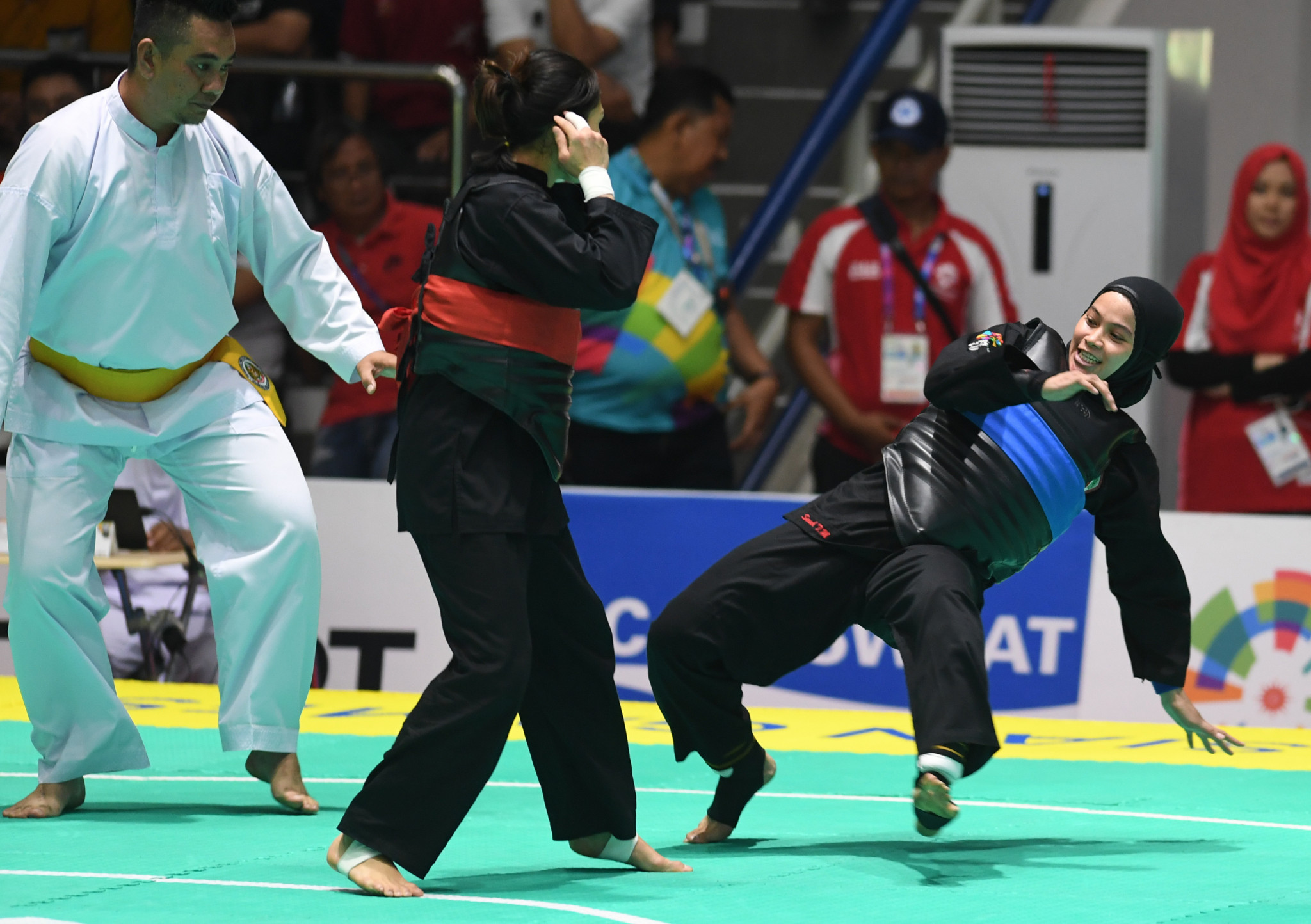 Sarah Tria Monita, blue, won one of Indonesia's incredible eight pencak silat golds today, in the women's class C 55-60kg final ©Getty Images