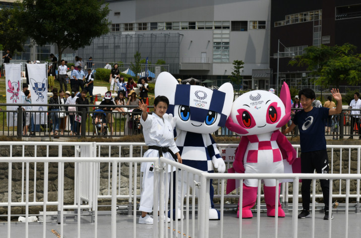 Tokyo 2020 Olympics Games mascots Miraitowa and Someity are introduced alongside karate practitioner Kiyo Shimizu and Para-athlete Hajimu Ashida ©Getty Images   