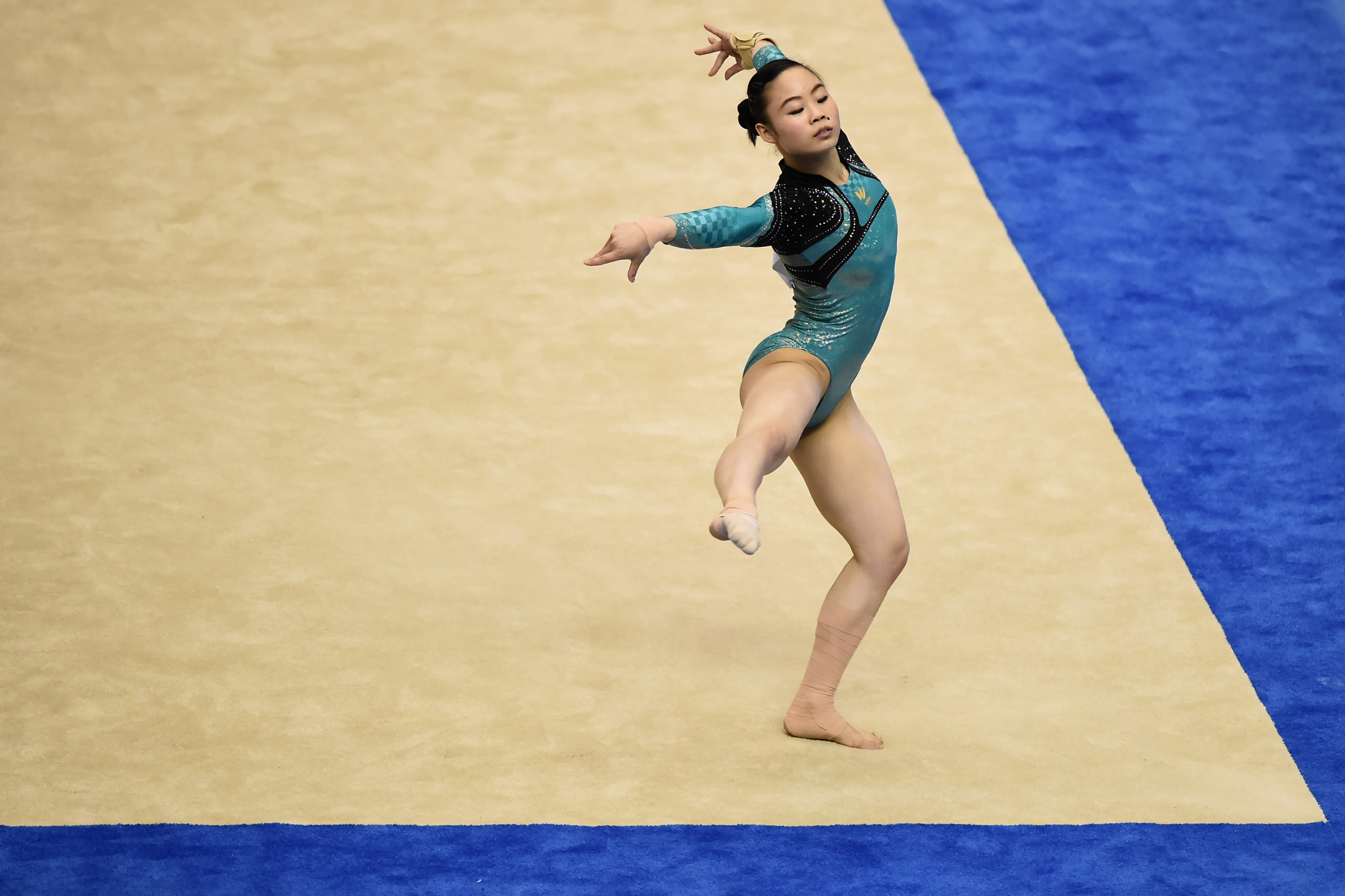 The Japanese gymnast competed at the 2016 Rio Olympics but may not attend the gymnastics World Championships in Doha without her coach ©Getty Images