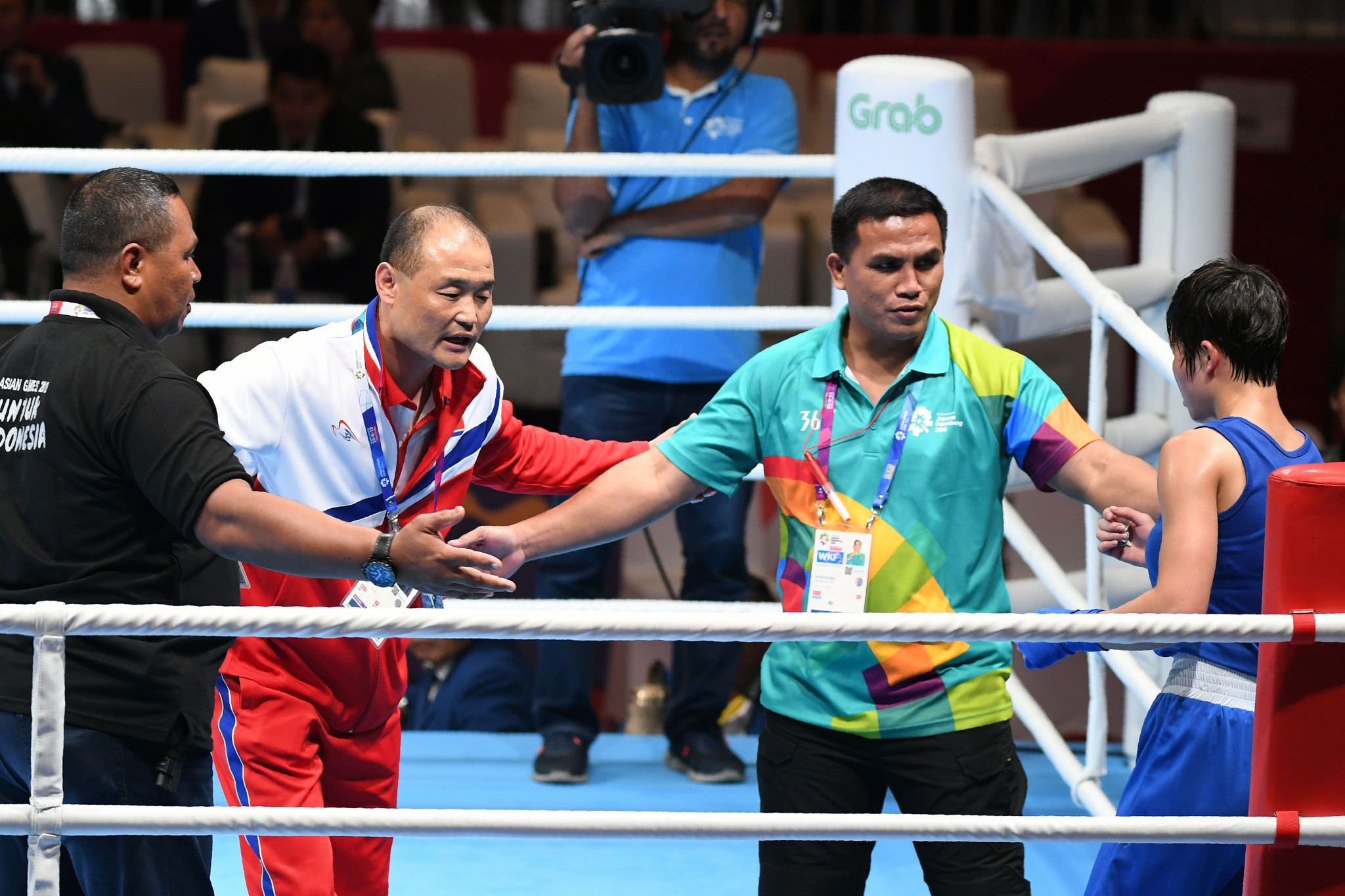 North Korean coach Pak Chol Jun protests in the ring at the Asian Games ©Getty Images
