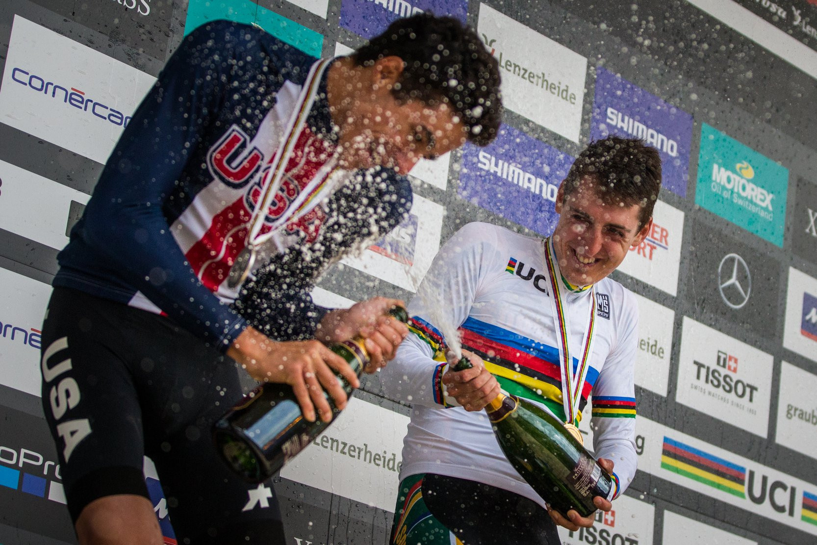 South Africa's Alan Hatherly, right, celebrates victory in the XCO category at the UCI Mountain Bike World Championships in Switzerland ©UCI