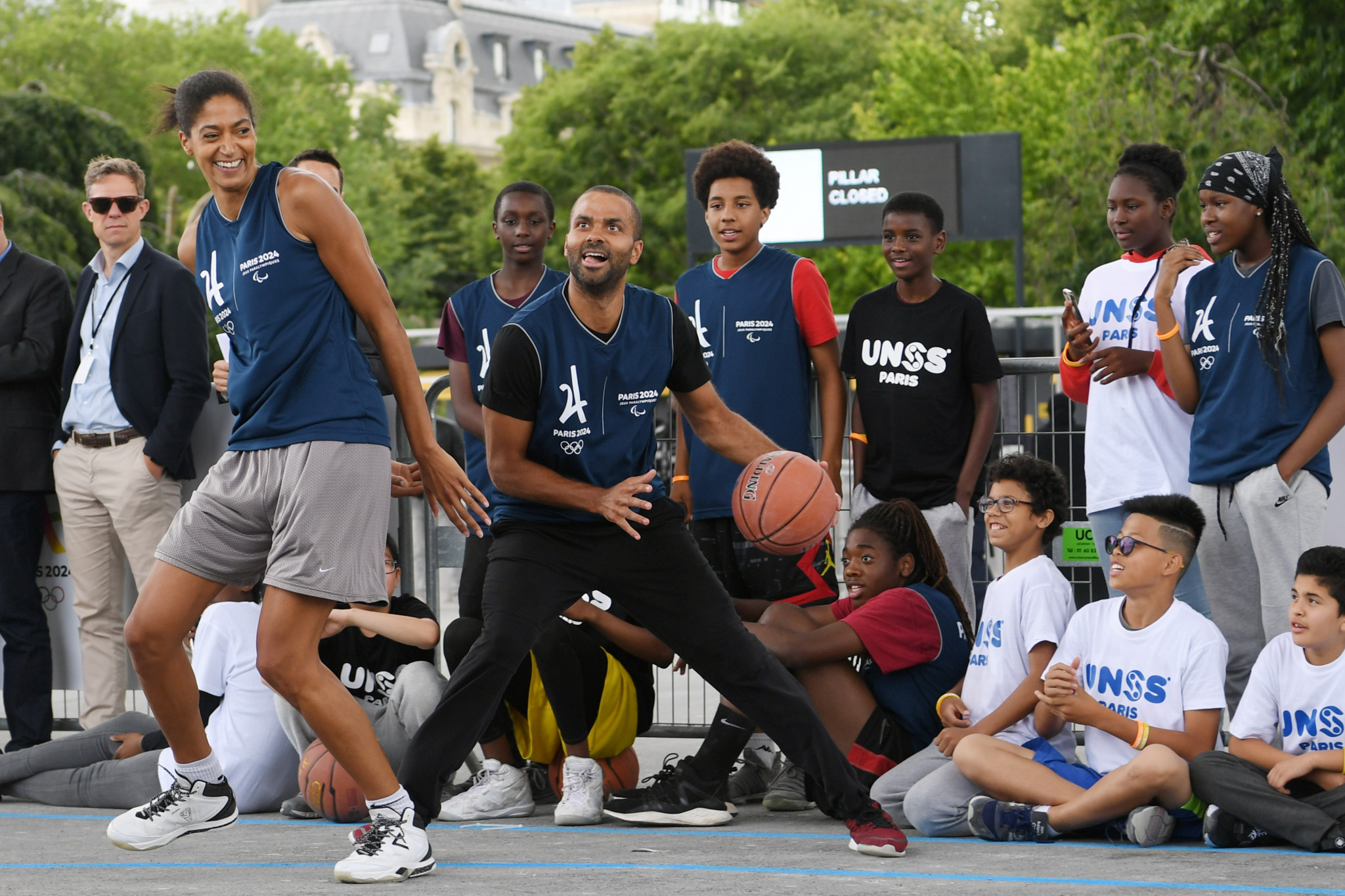French basketball player Tony Parker, centre, says it is his "mission" to promote sport among young people ©Paris 2024
